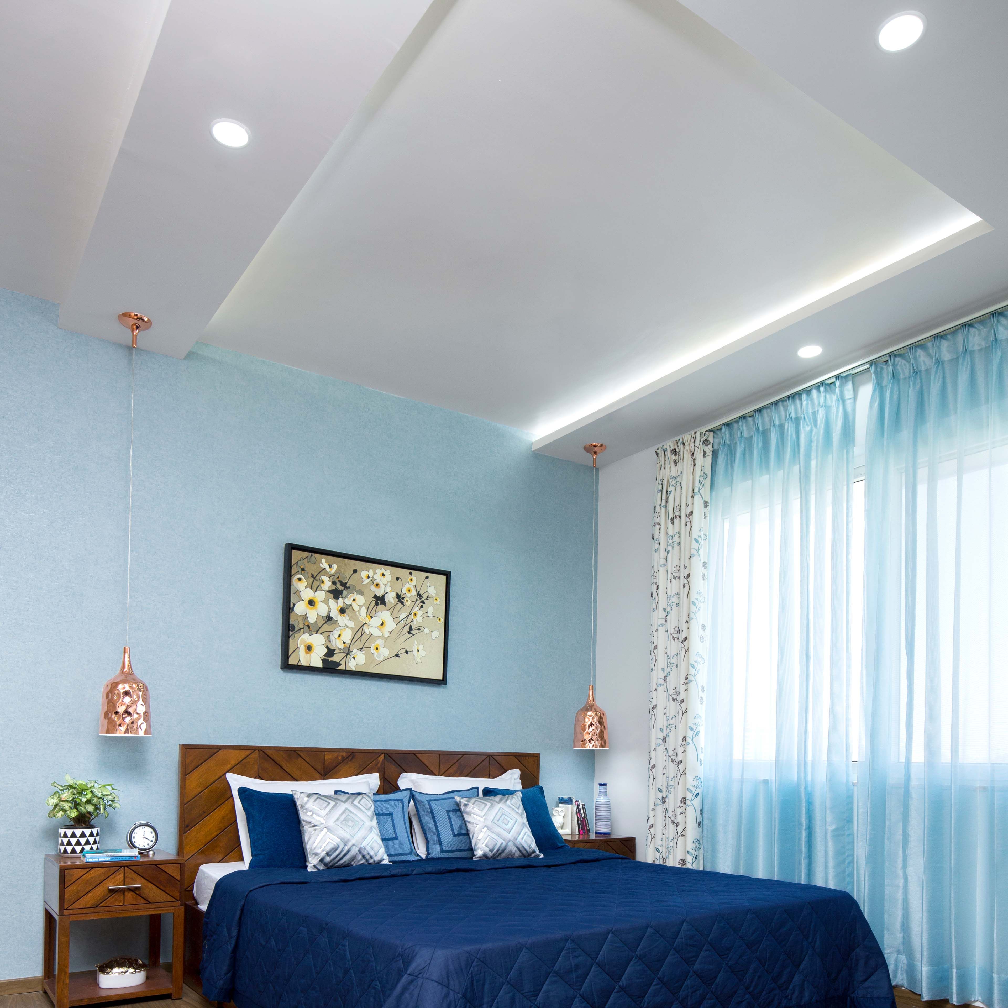 Compact U-Shaped Peripheral Ceiling Design With Ceiling Lights And Recessed Lights For Bedroom - Livspace