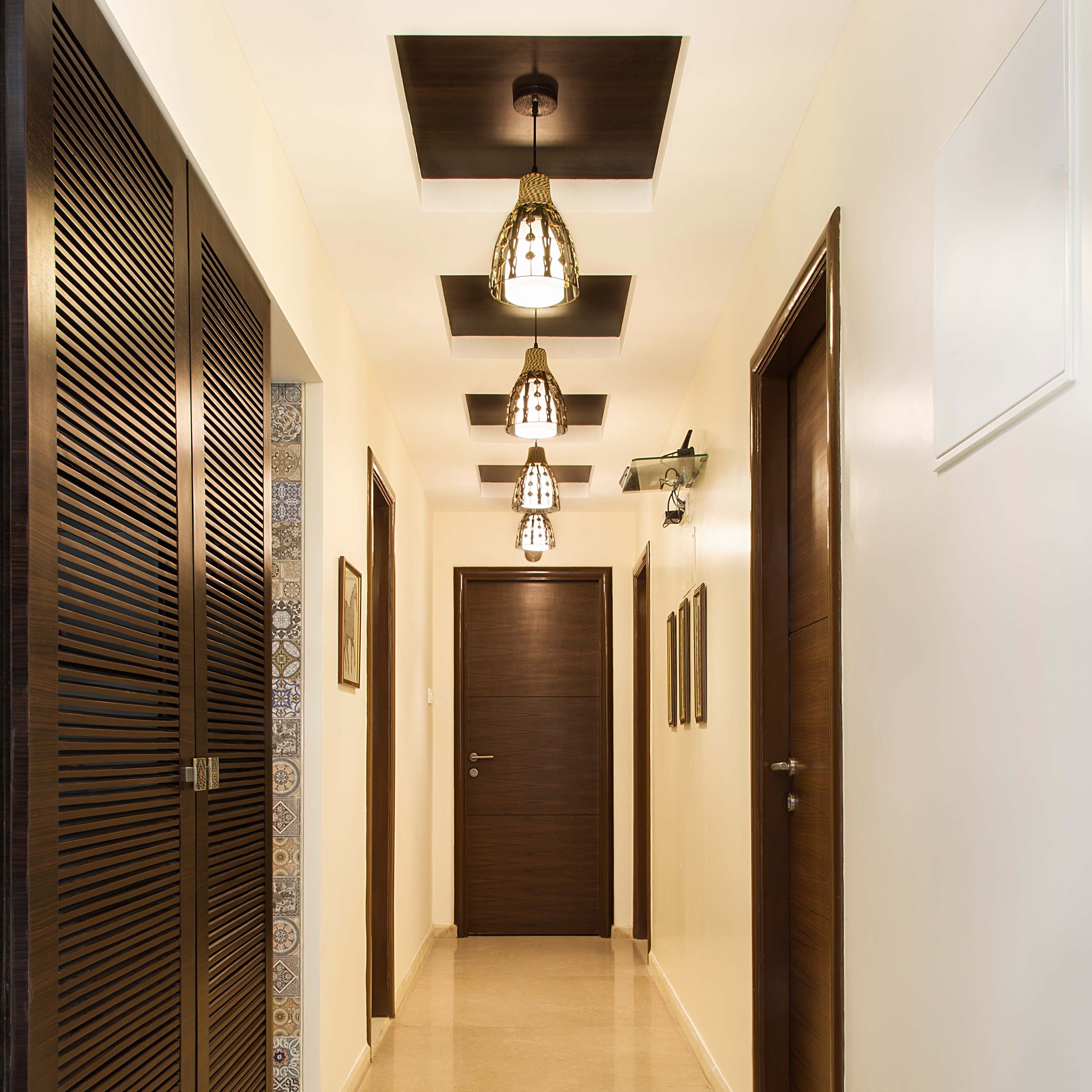 Wood And Gypsum Coffered False Ceiling Design With Drop Down Lights For Foyer - Livspace