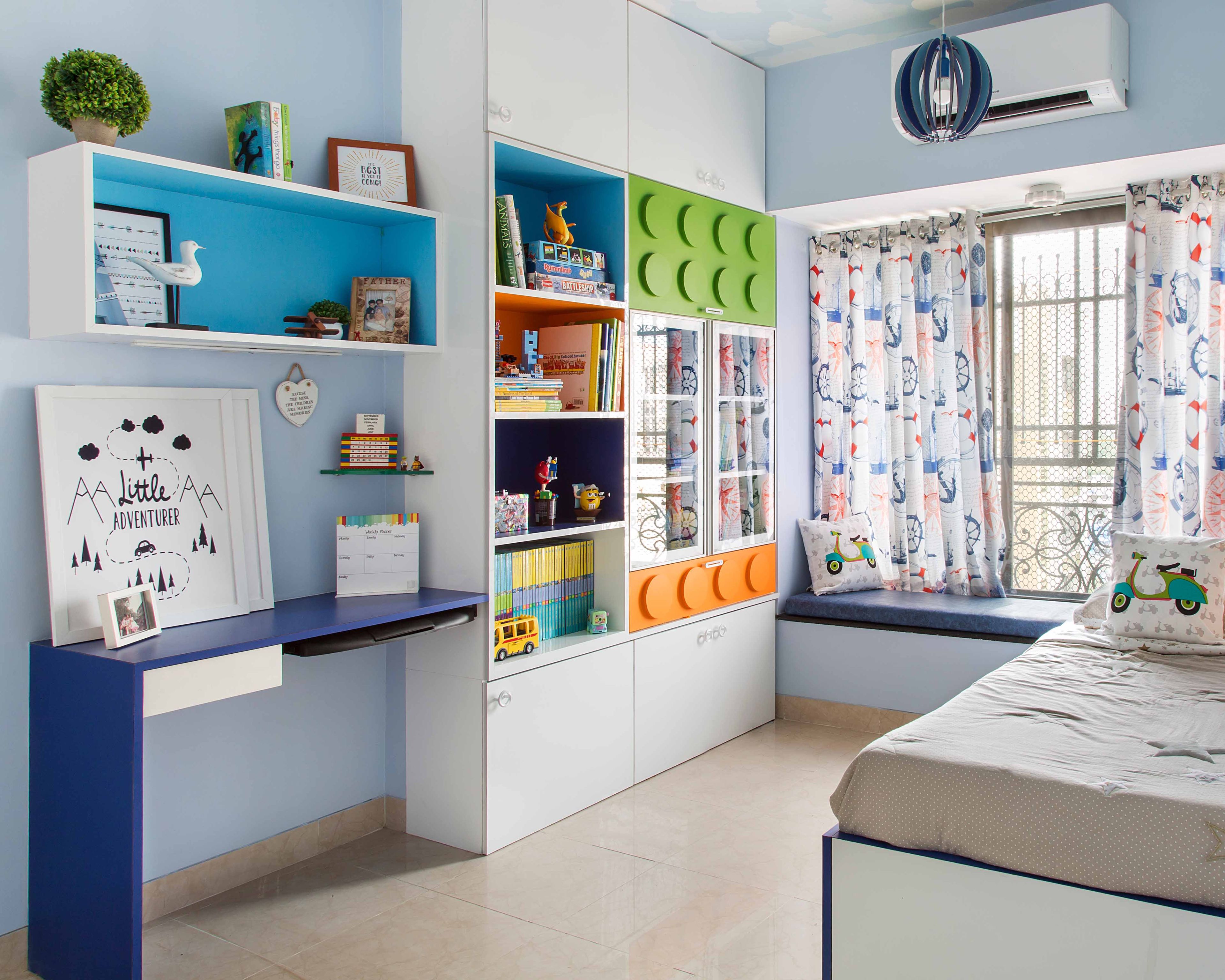Contemporary Blue And White Home Office Design With Open Shelves And Tall Storage Unit