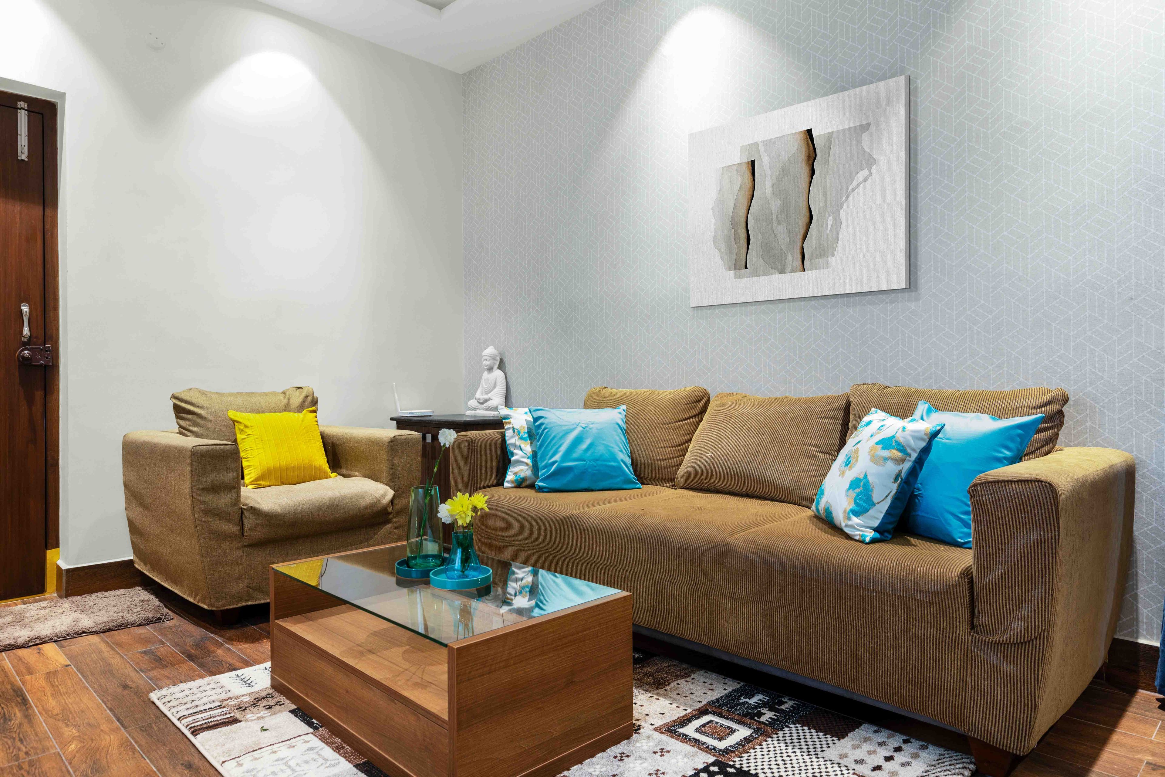 L-Shaped Brown Sofa Set With Colourful Cushions - Livspace