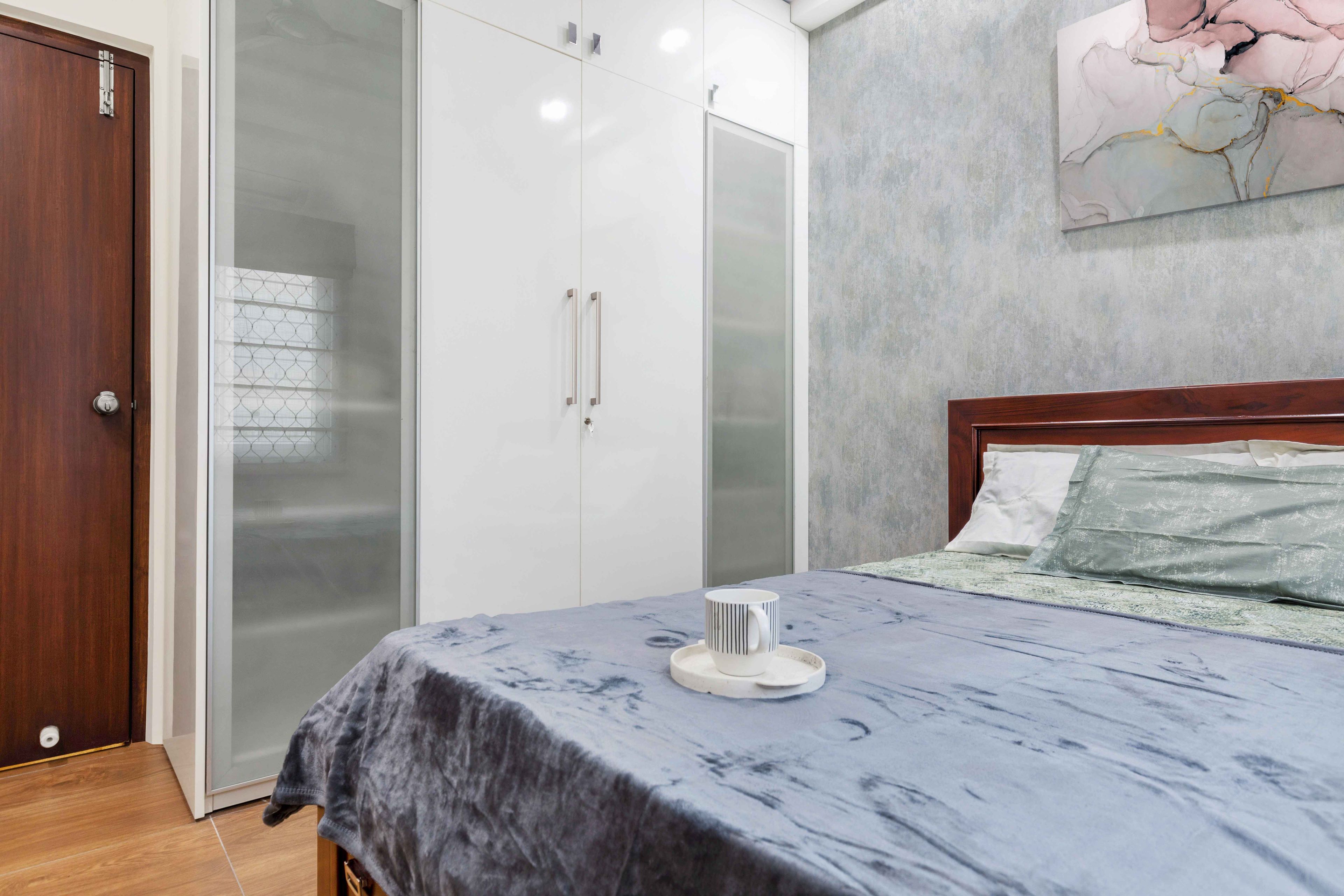 Master Bedroom With Grey Textured Wall Design, Wooden Bed And 2-Door White Swing Wardrobe - Livspace