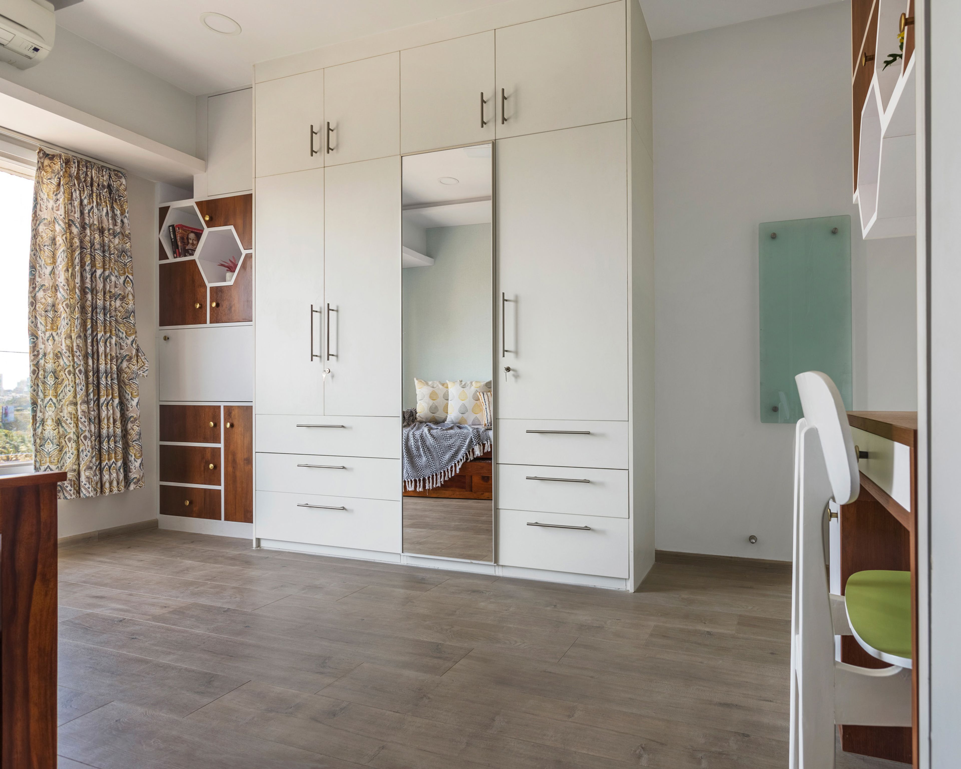 4-Door White Swing Wardrobe With Loft Storage And Mirror, Integrated Wood And White Storage Unit And Study Table In Kids Room - Livspace