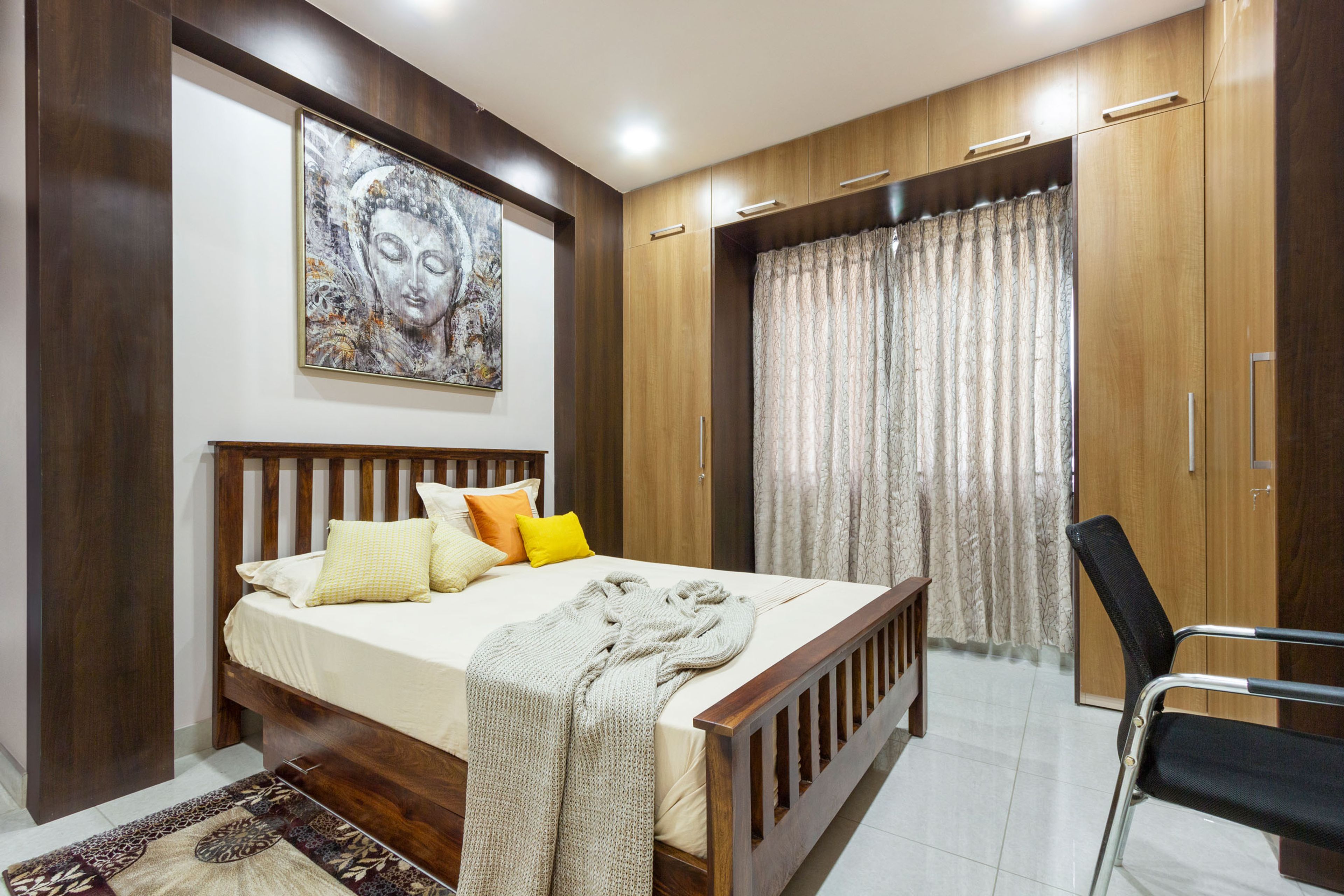 Classic Bangalore 3-BHK Interior Design With Spacious L-Shaped 6-Door Wooden Swing Wardrobe For The Master Bedroom