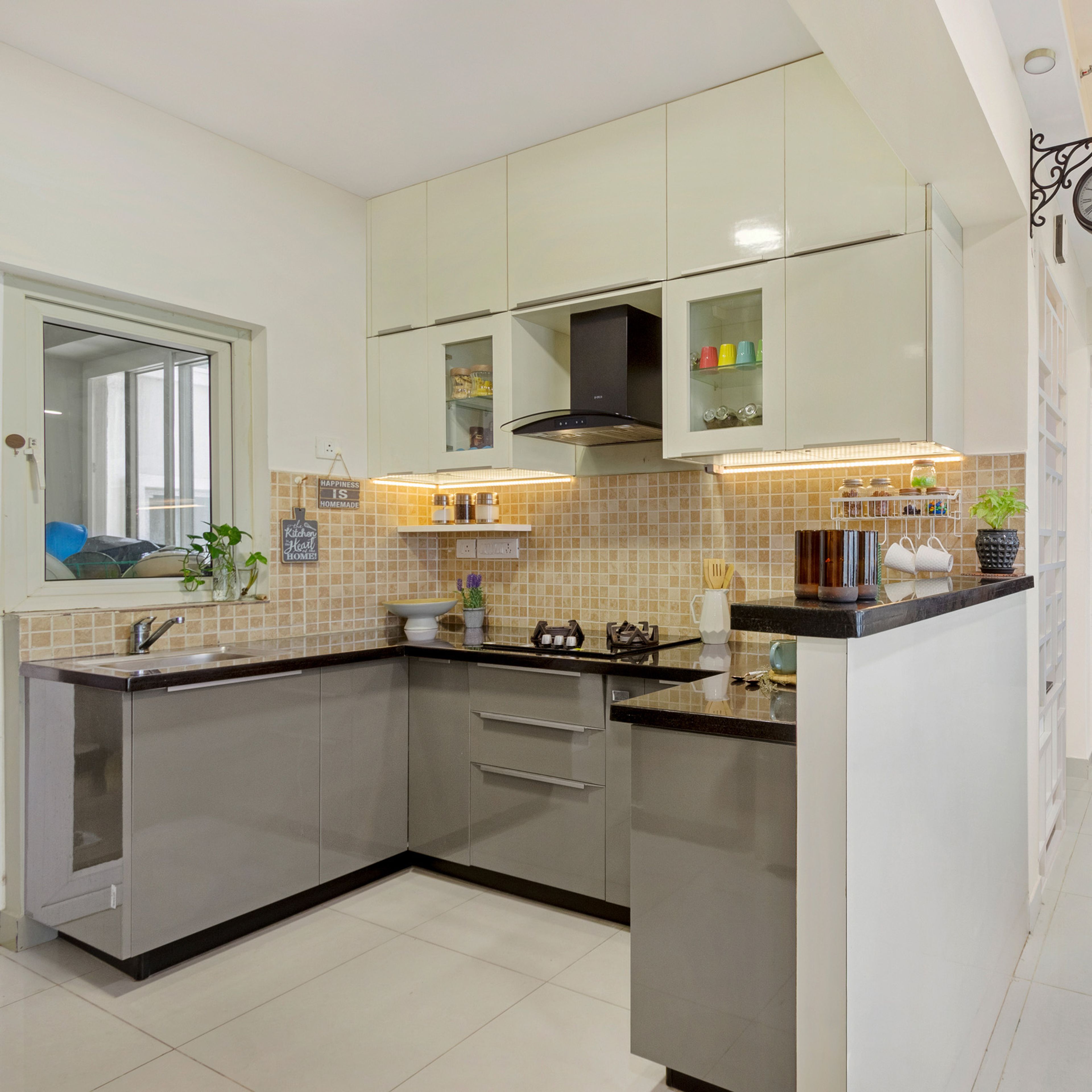 Modern 1-BHK Interior Decoration In Bangalore With A Beige And Peach Foyer Design