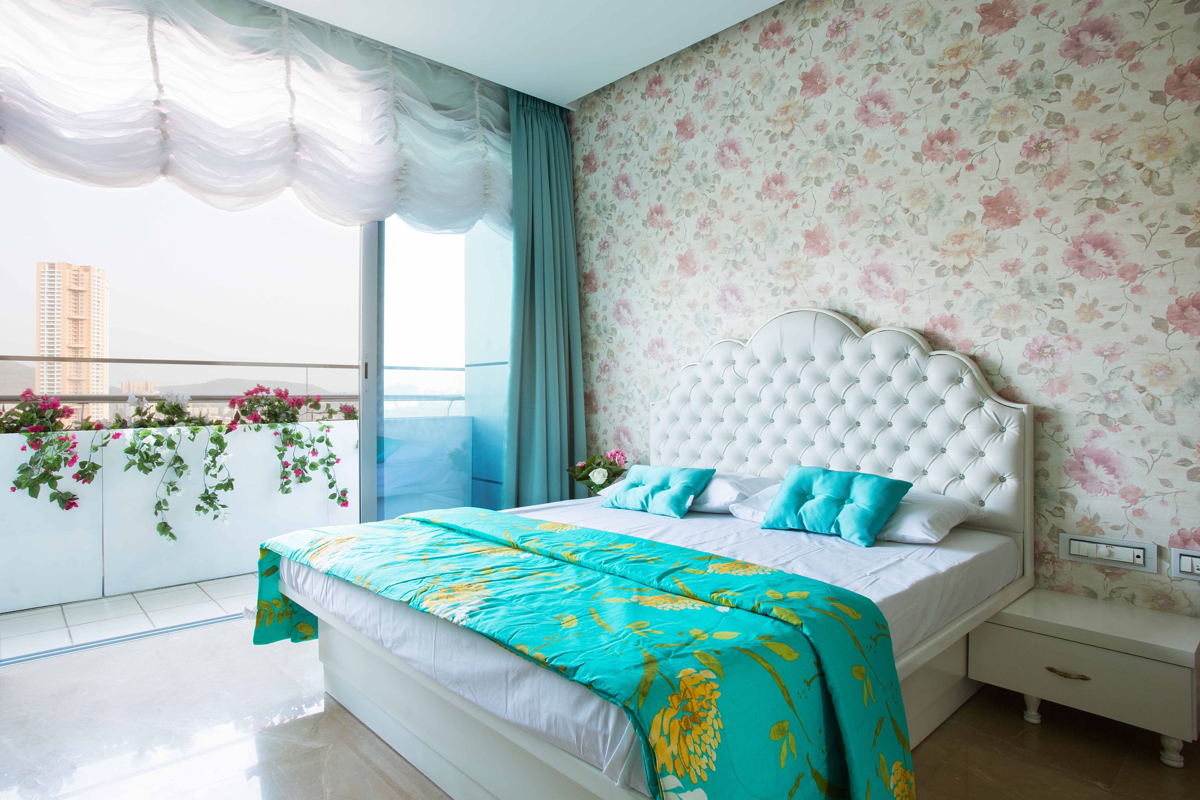 White And Blue Guest Bedroom With Floral Wallpaper - Livspace