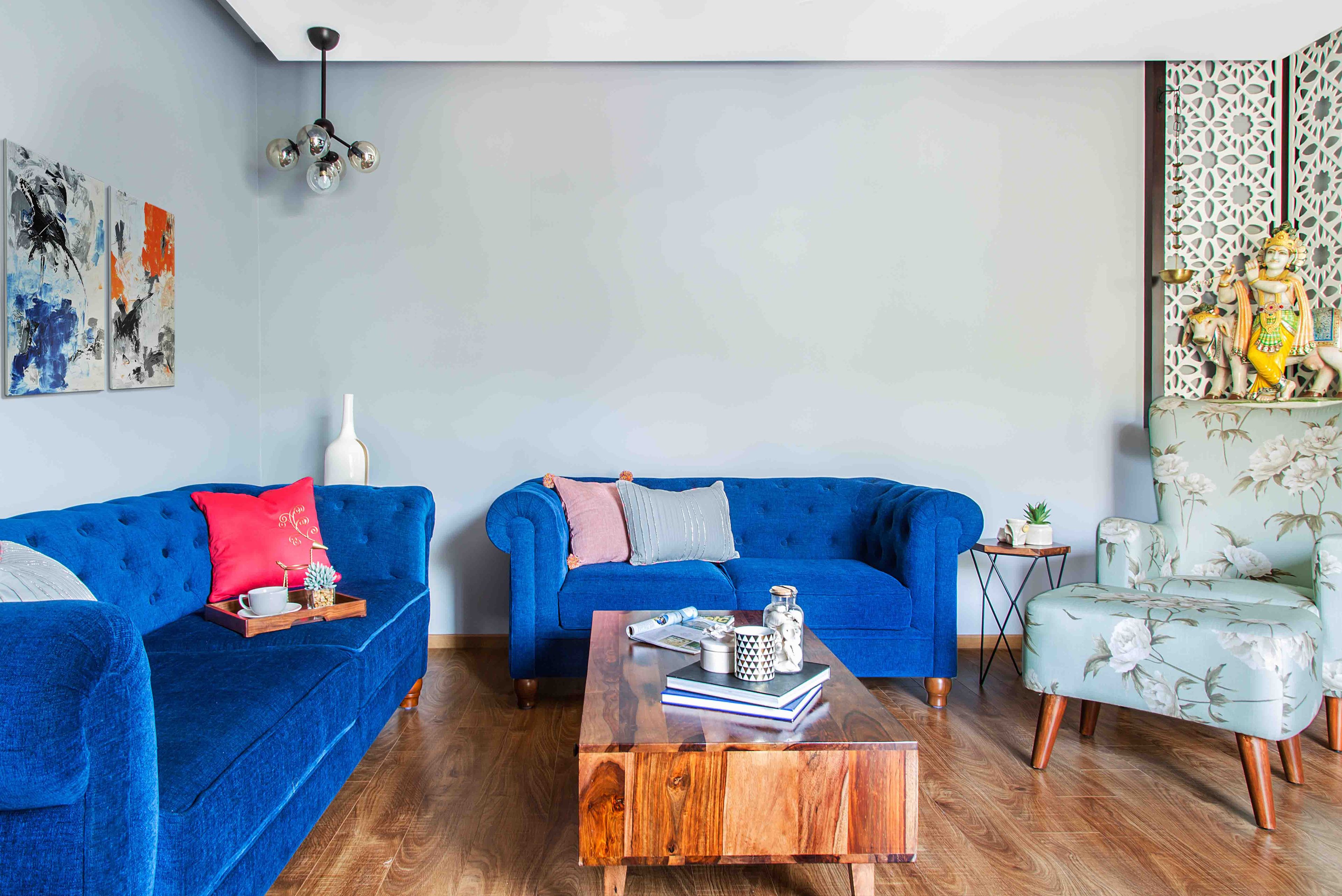 L-Shaped Blue Sofa Set WIth Light Blue Foral Accent Chair - Livspace