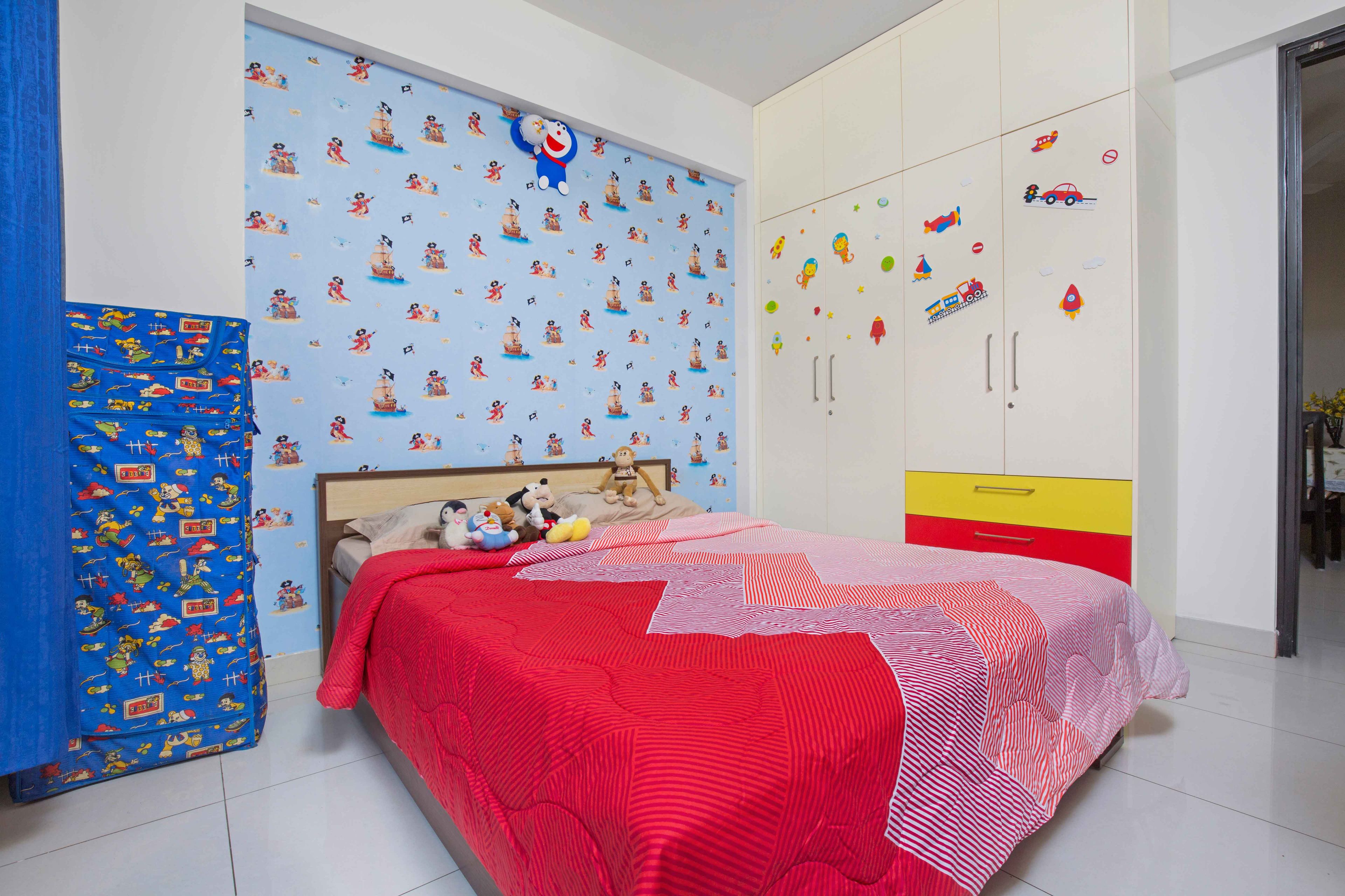 Multicoloured Kids Room Design WIth 4-Door Swing Wardrobe And Colourul Drawer Storage - Livspace