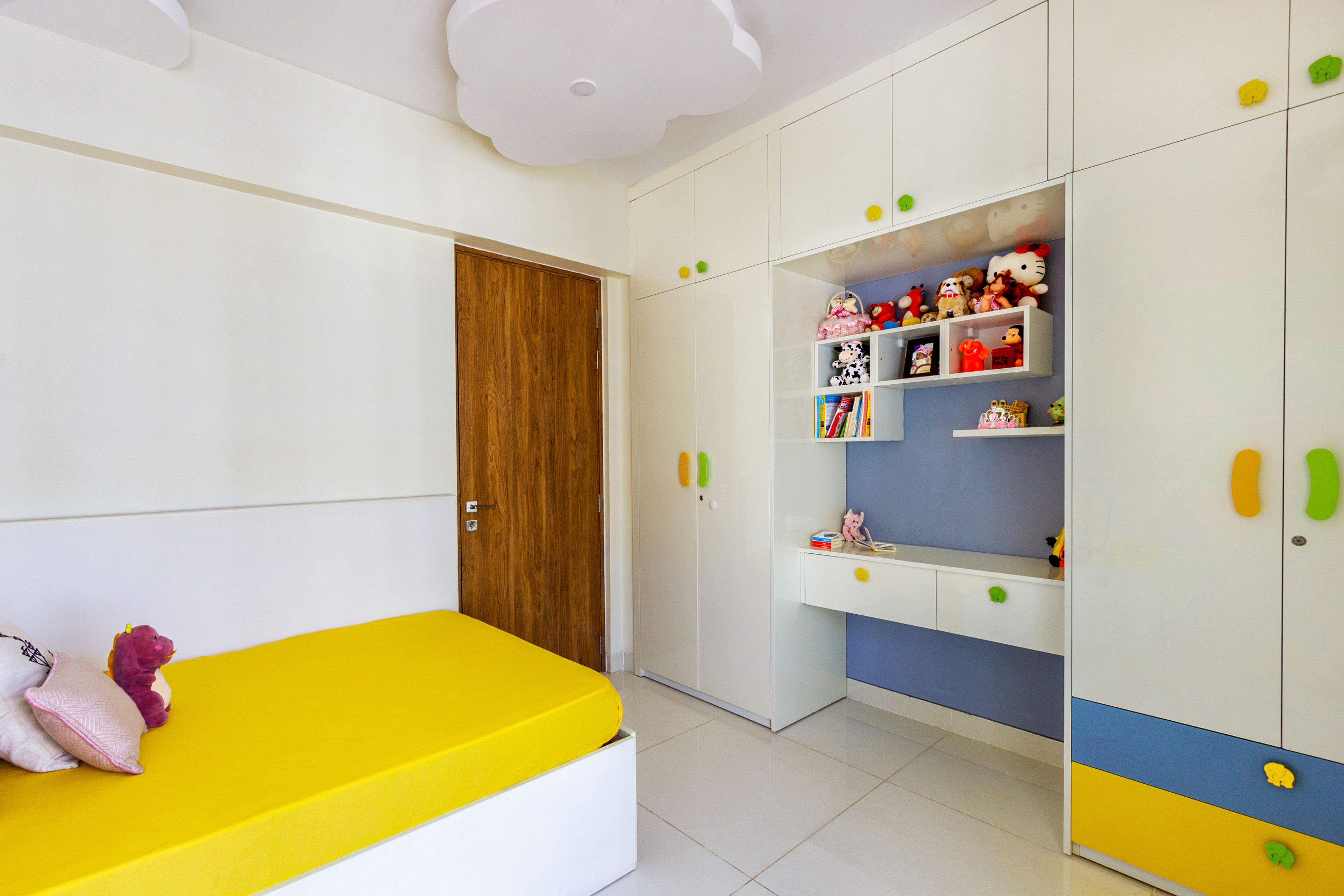 4-Door Off-White Swing Wardrobe With Multicoloured Drawer Storage For Kids Room - Livspace