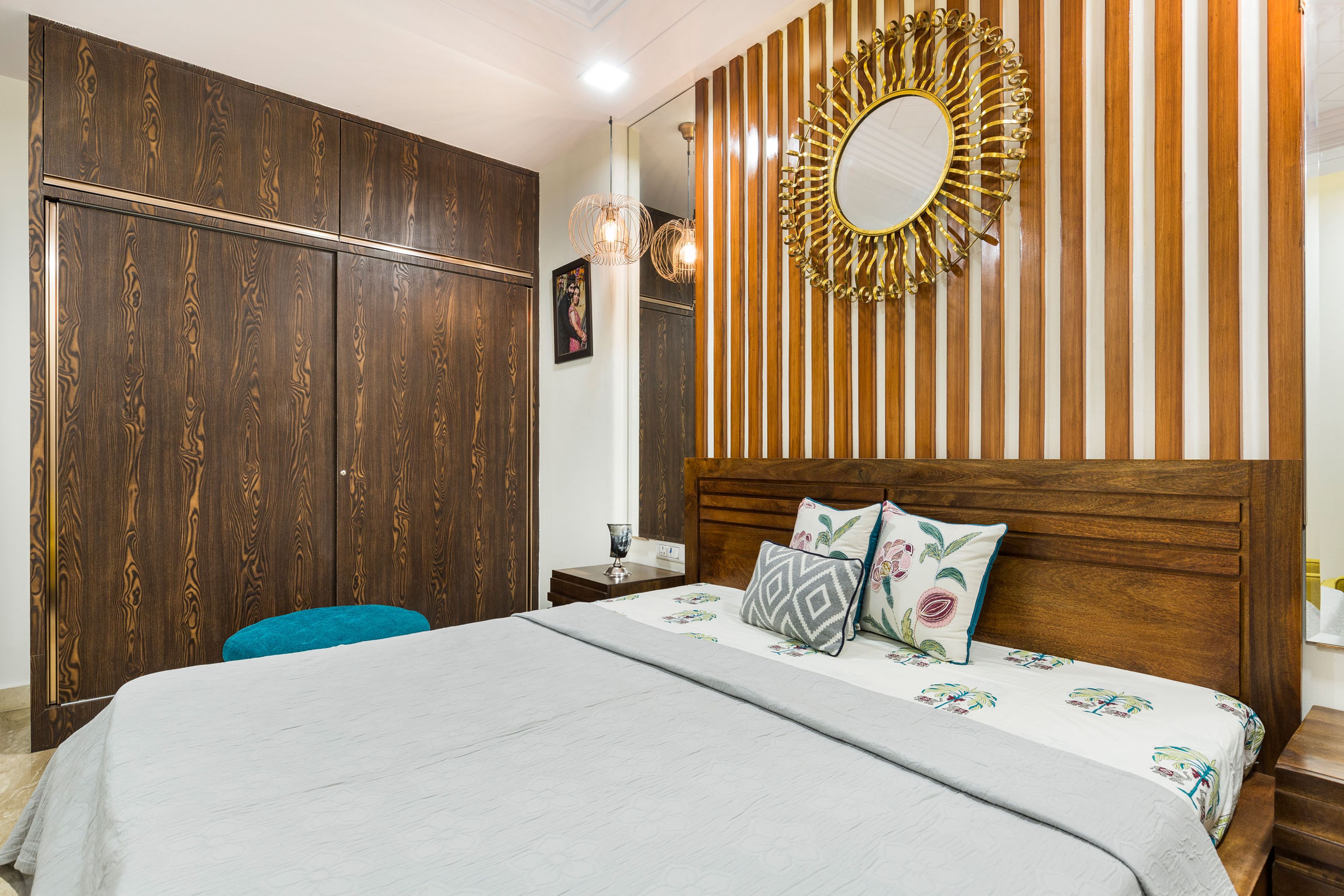 Master Bedroom With Wooden Bed, Wooden 2-Door Sliding Wardrobe And Wooden Wall Panels - Livspace