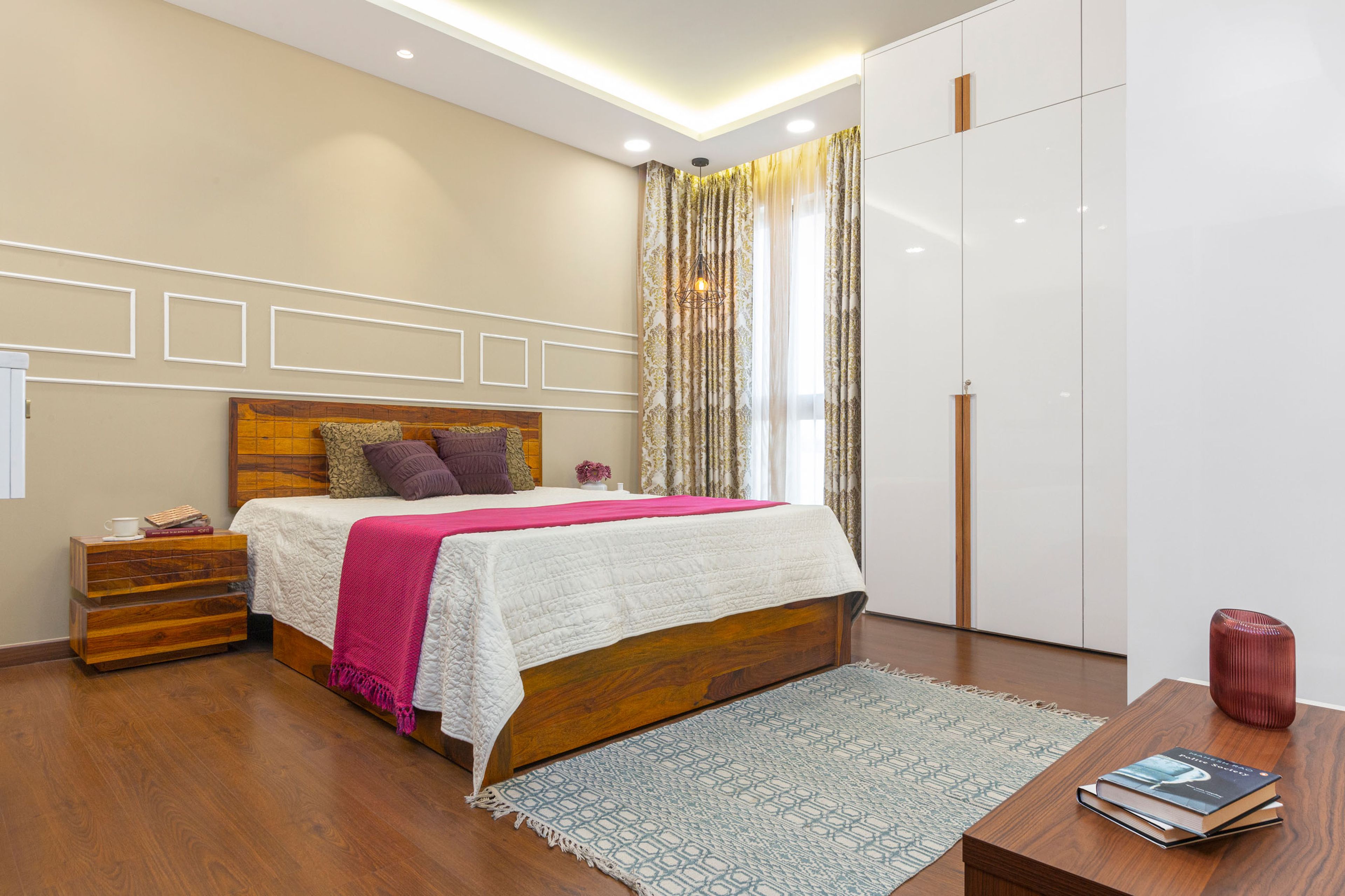 Guest Room With 4-Door White And Wood Swing Wardrobe And Loft Storage - Livspace