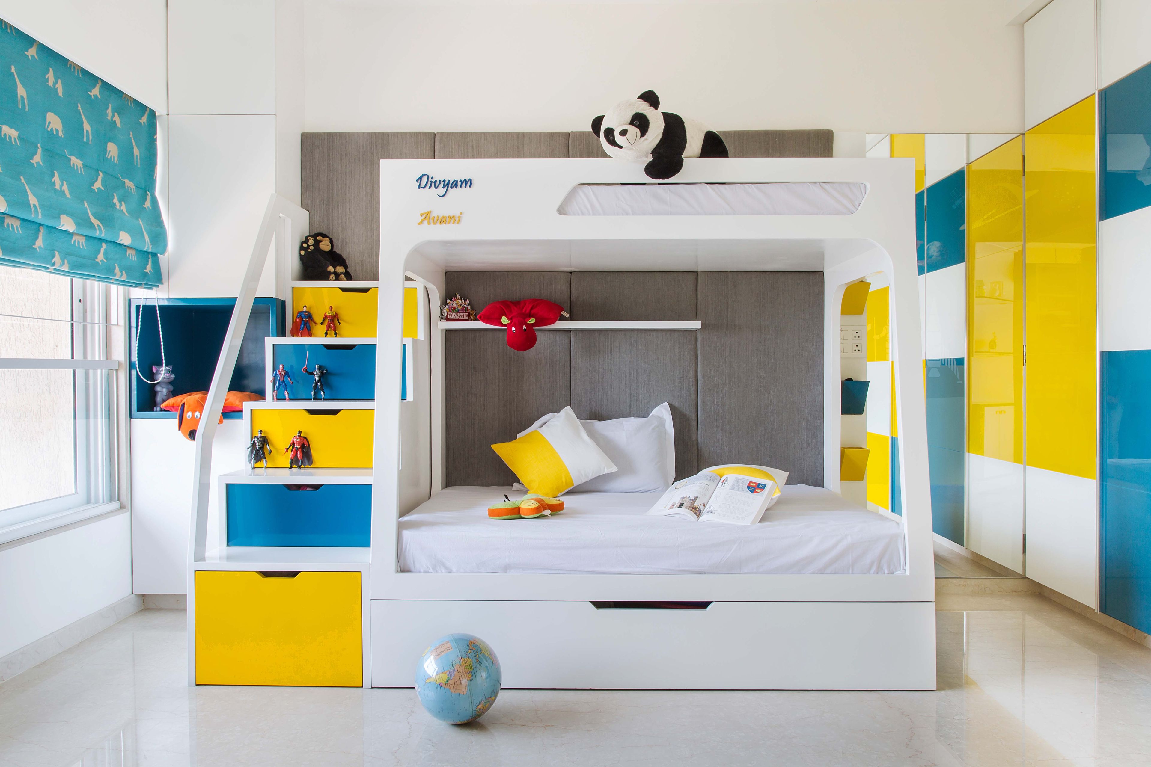 Bright Kids Room With White Bunk Bed, Yellow And Blue Steps And 2-Door Sliding Wardrobe - Livspace