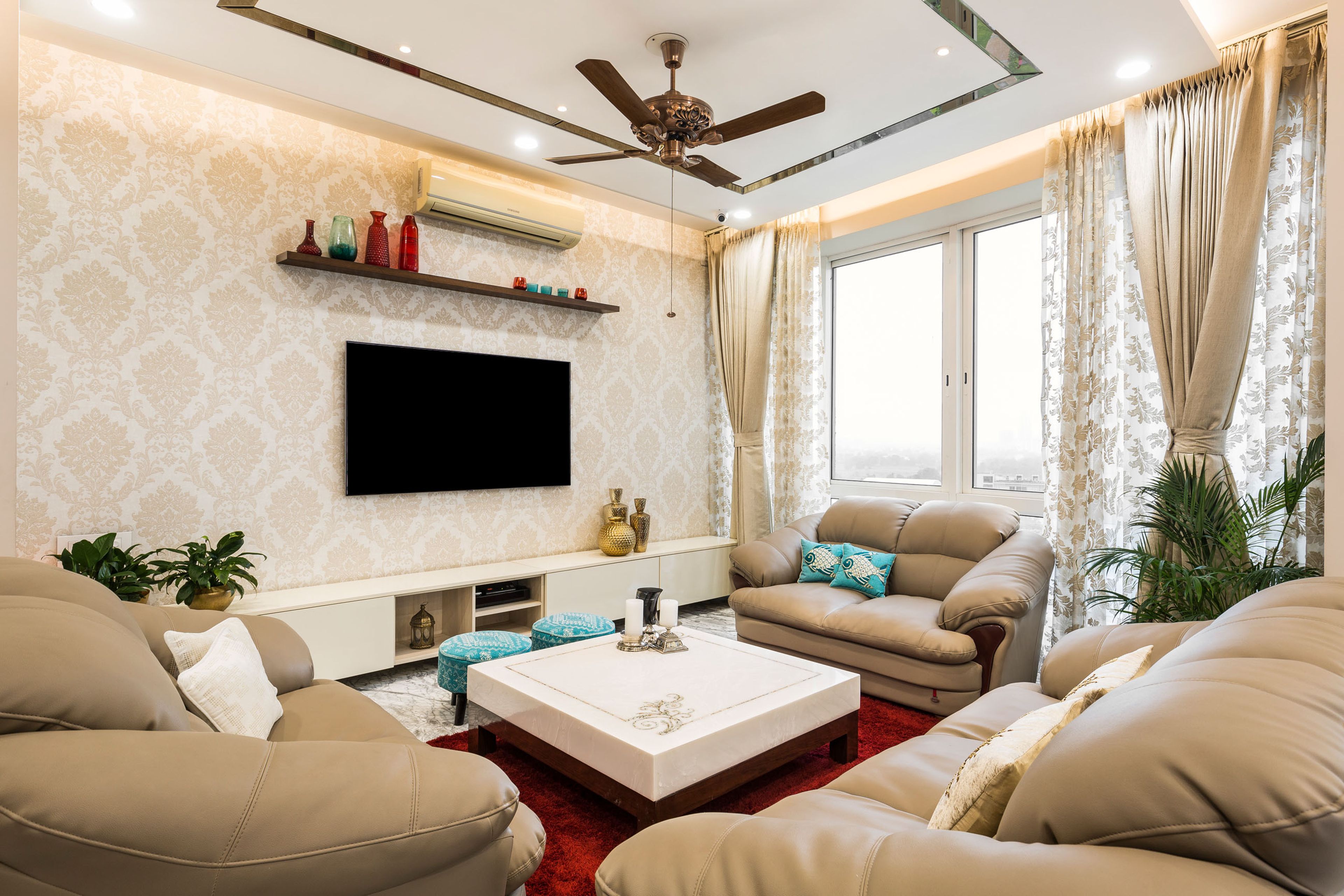 Beige U-Shaped Living Room Design With Damask Wallpaper - Livspace