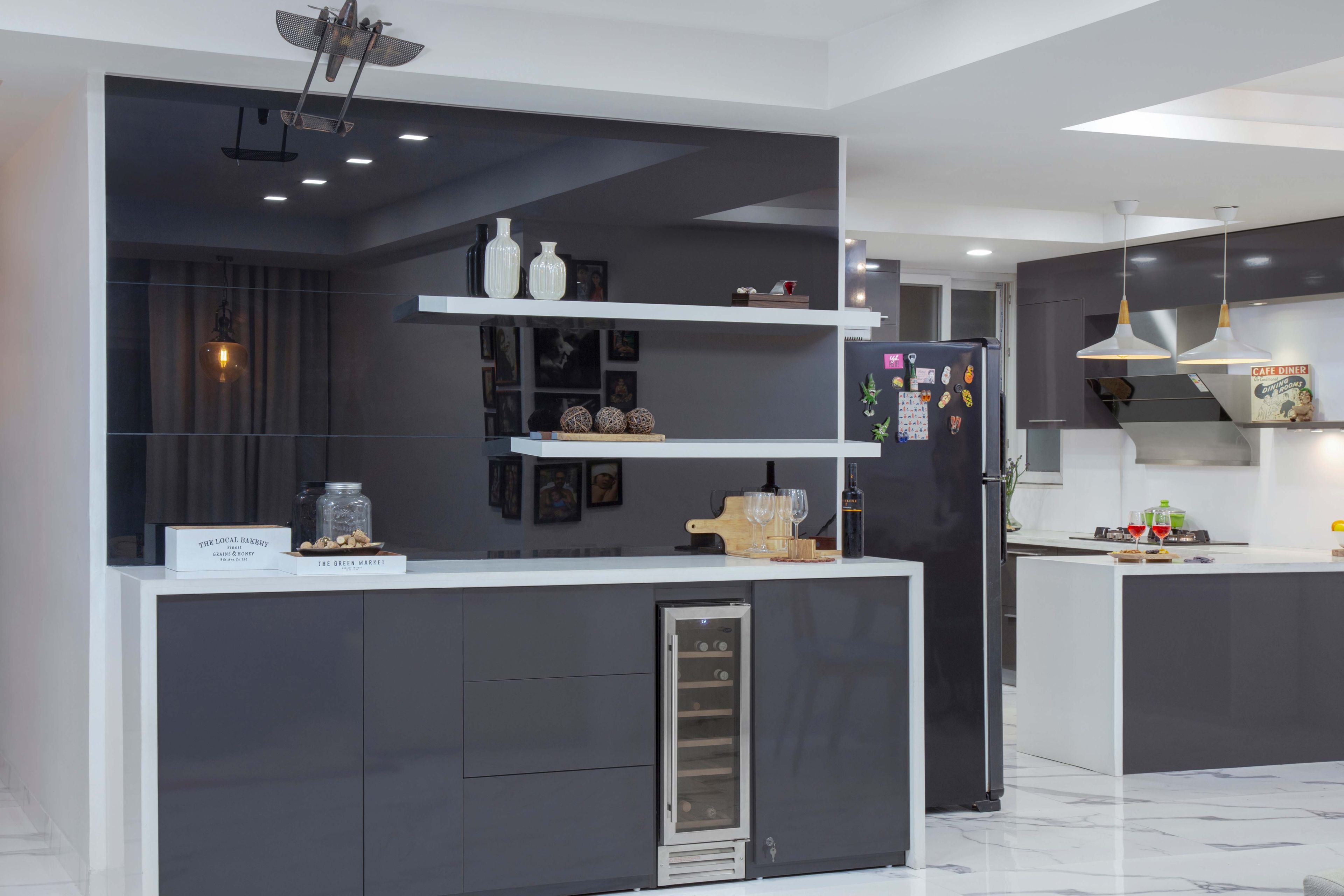 Glossy Grey And White Modular Open Kitchen Design With Storage Unit - Livspace