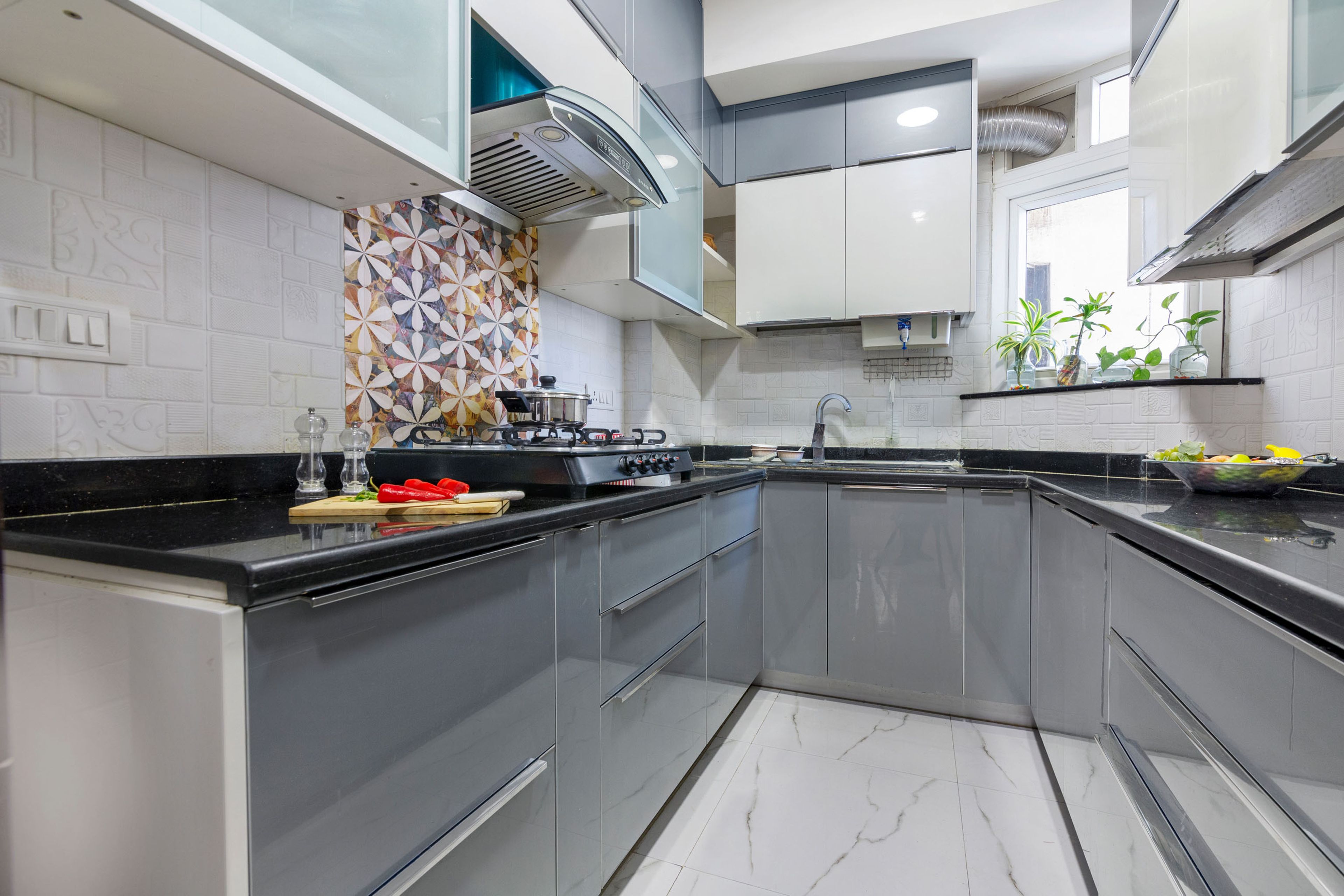 U-Shaped Grey And White Modular Kitchen With White And Multicoloured Dado Tiles - Livspace
