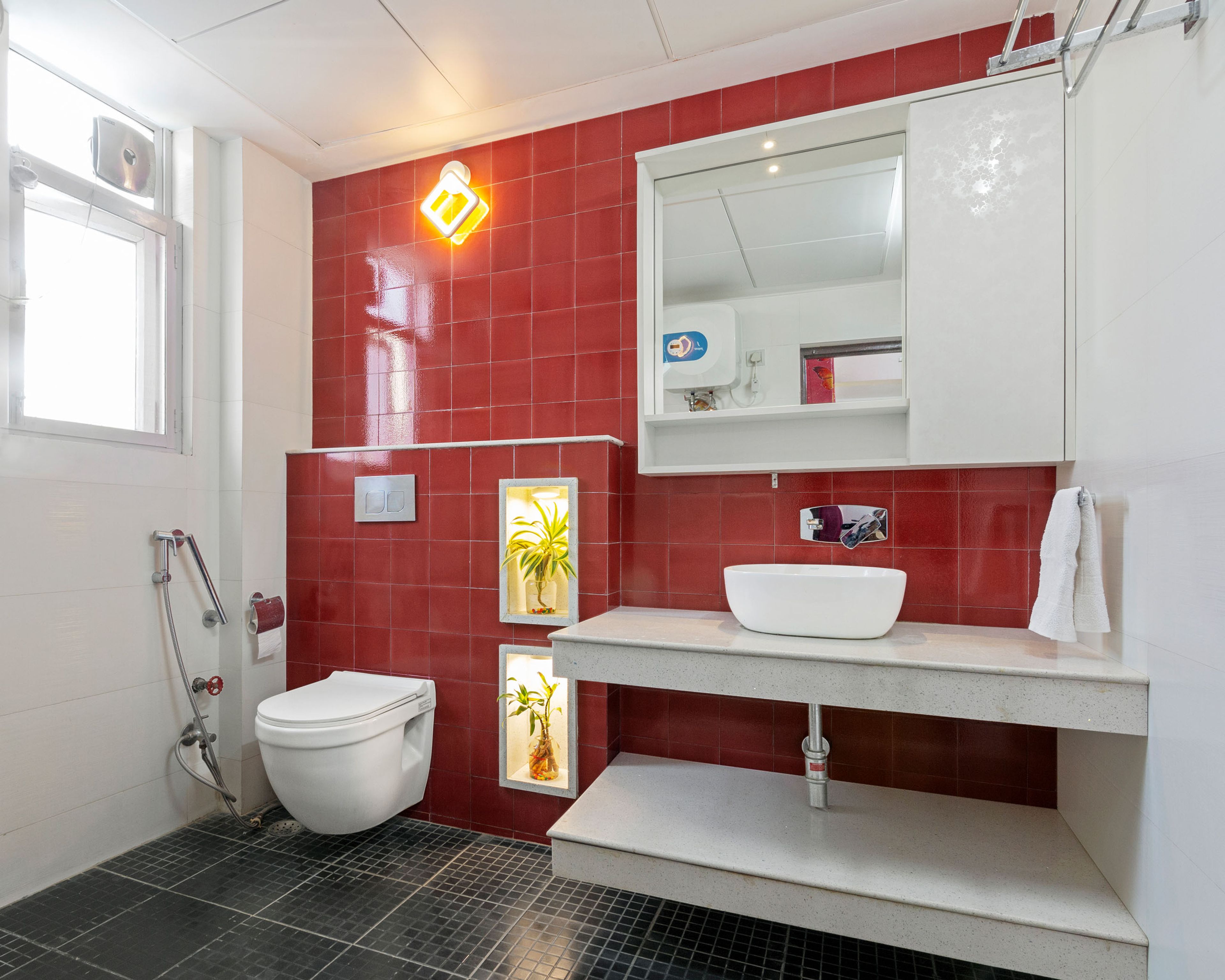 Compact Bathroom With Red Wall Tiles And Black Flooring Design - Livspace
