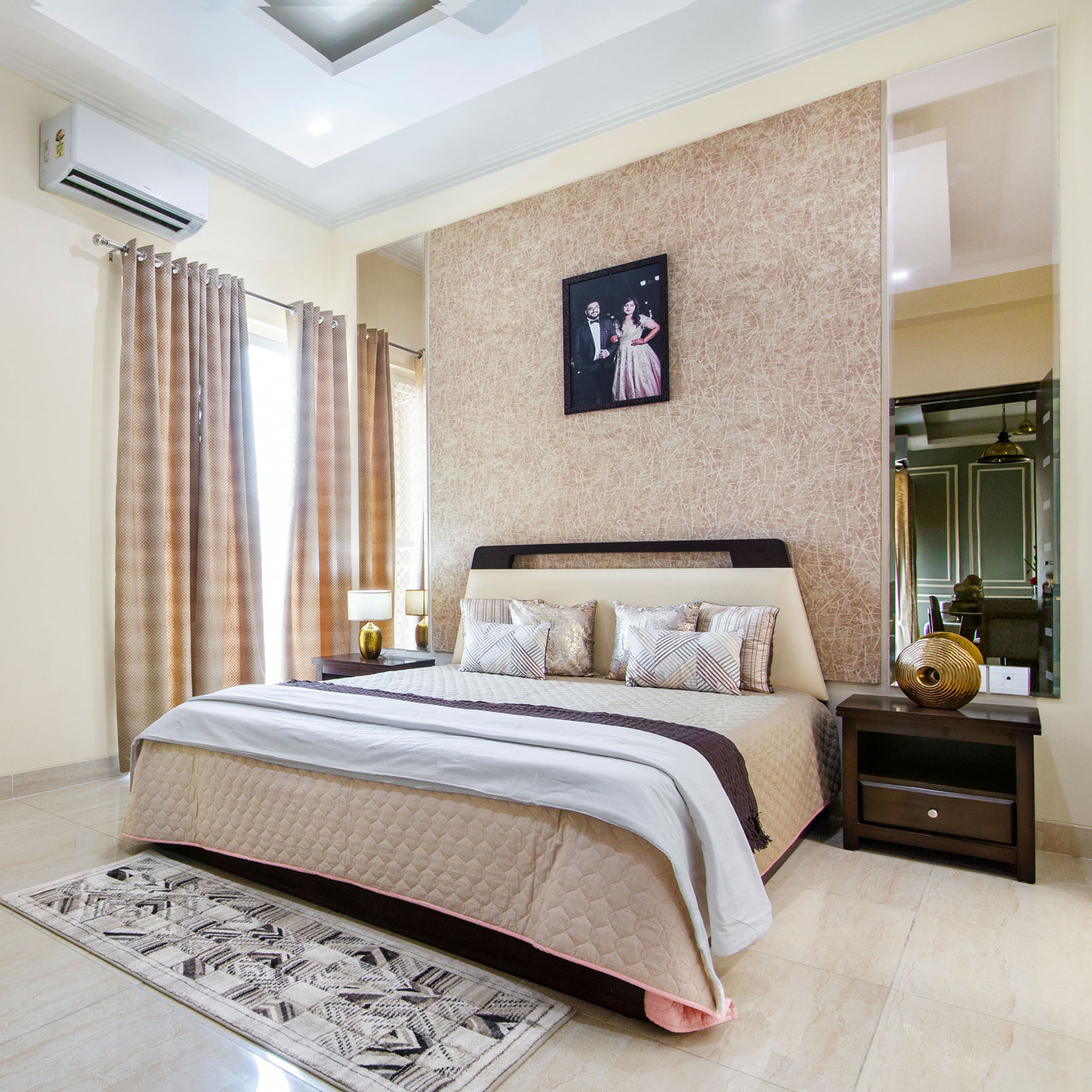 Beige Master Bedroom With Panelled Mirrors And Beige Textured Wallpaper - Livspace