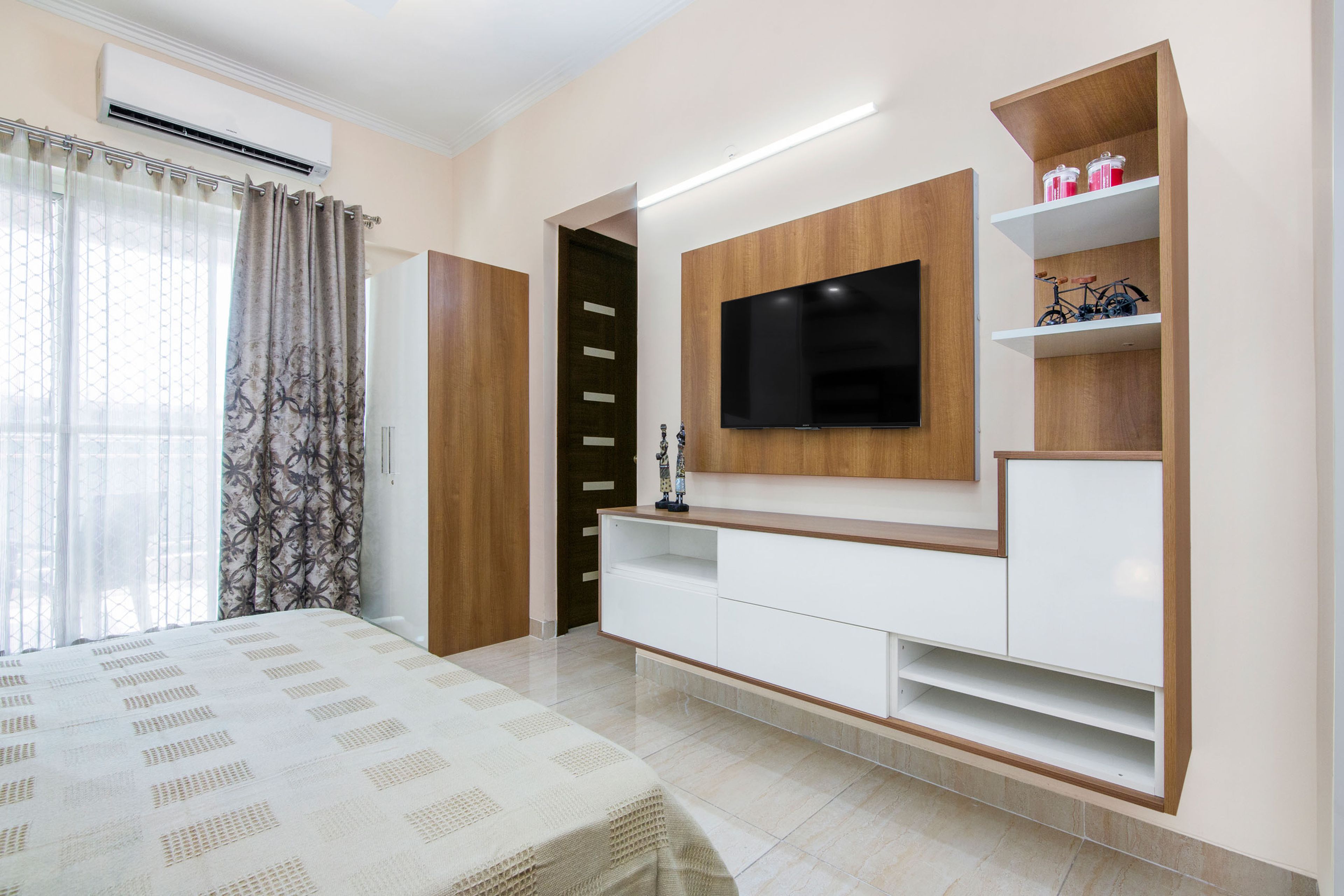 White And Wood Wall-Mounted TV Unit For Guest Bedroom- Livspace