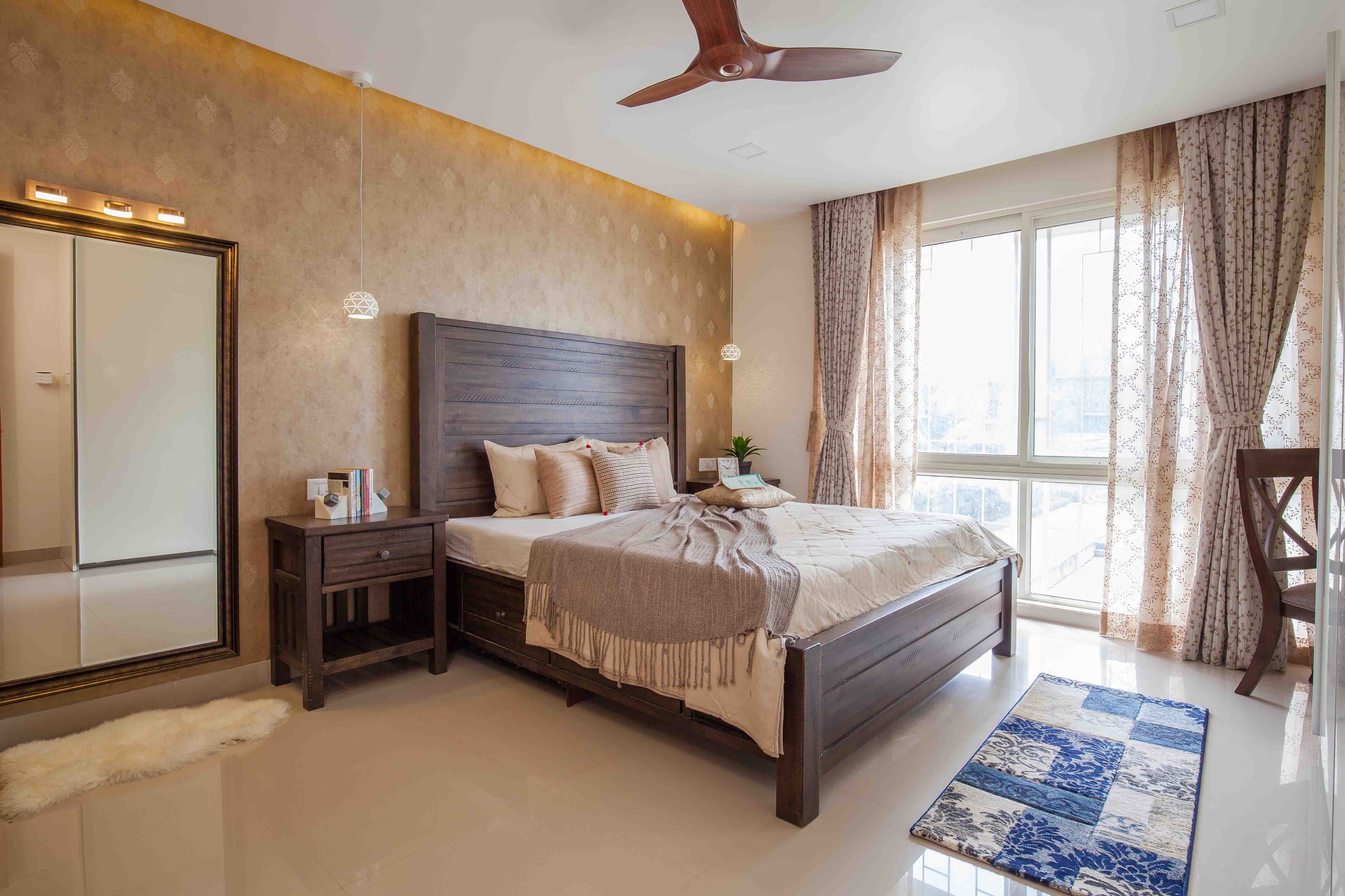 Beige Master Bedroom With Wooden Bed And Damask Wallpaper - Livspace