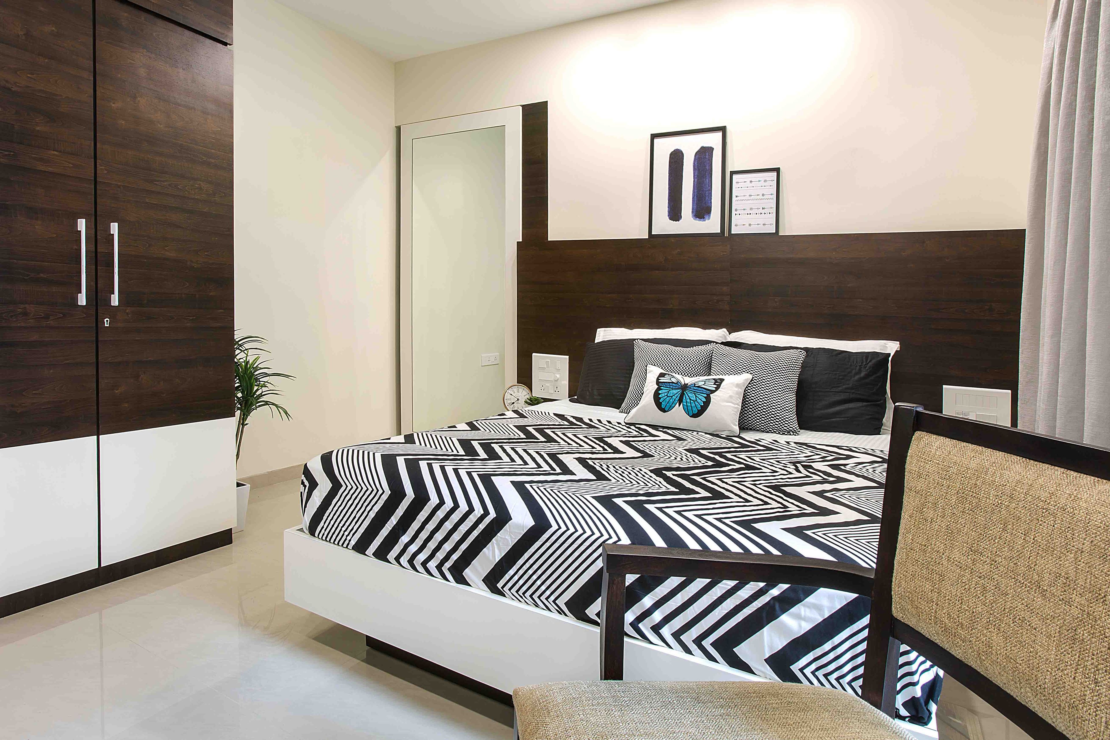 Master Bedroom With Dark Wood Bed, Wood And White 2-Door Swing Wardrobe - Livspace