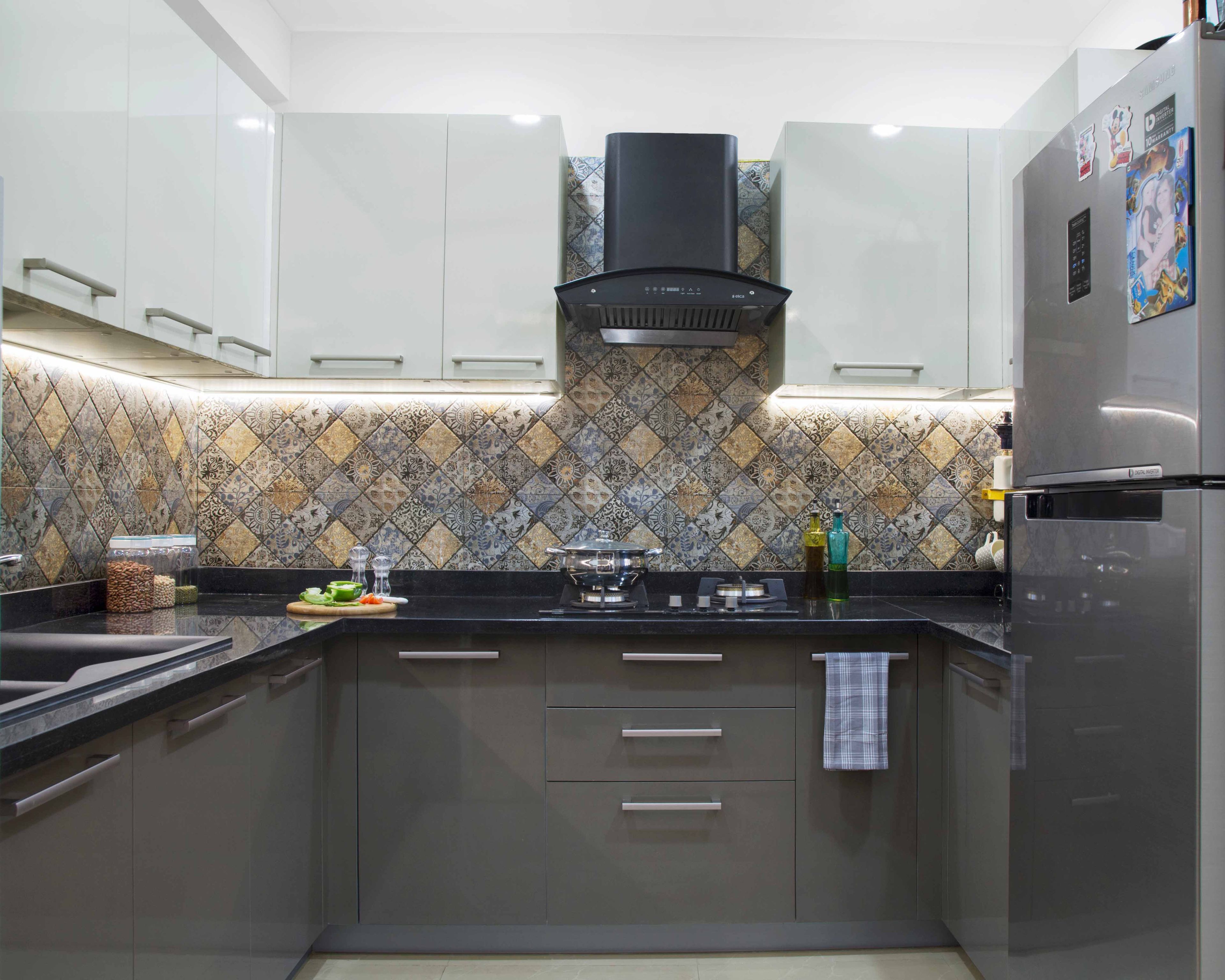 L-Shaped Grey And White Kitchen Design With Moroccan Dado - Livspace