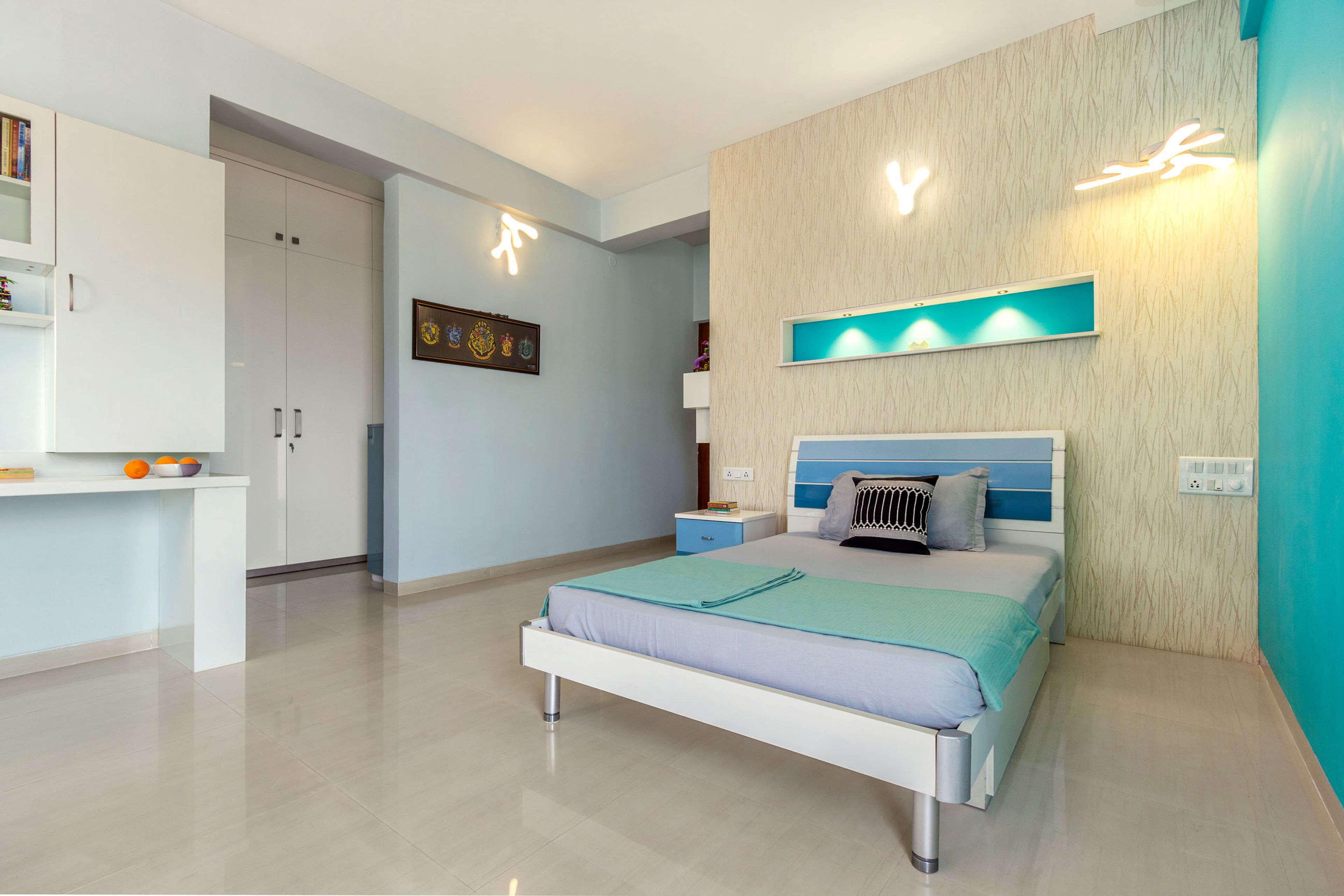 Blue And Beige Guest Room Design With White Walk-In Wardrobe - Livspace