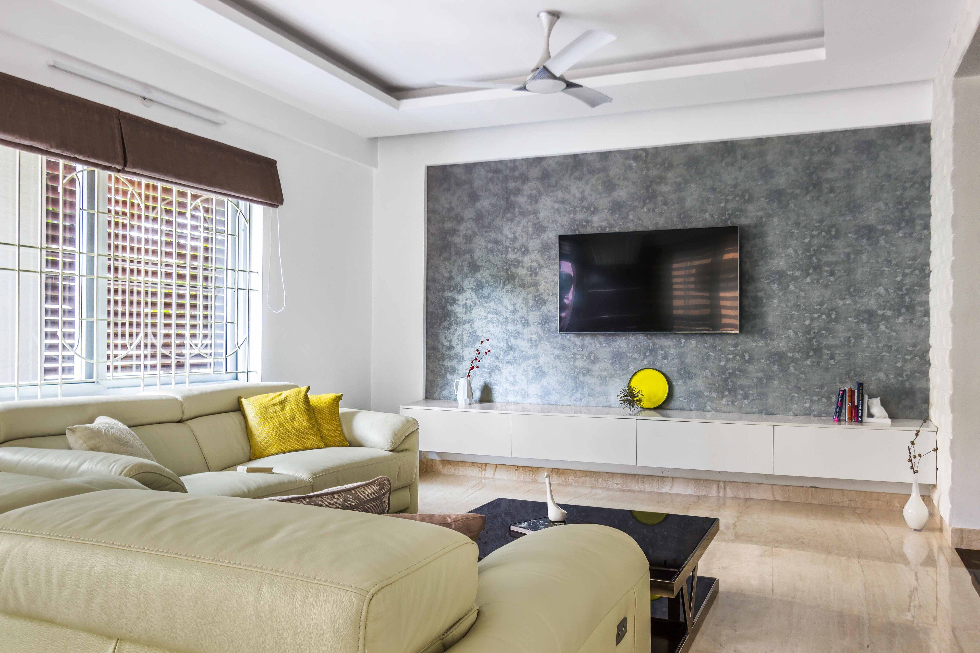 Contemporary 2-BHK Flat Design In Bangalore With Spacious Beige Living Room