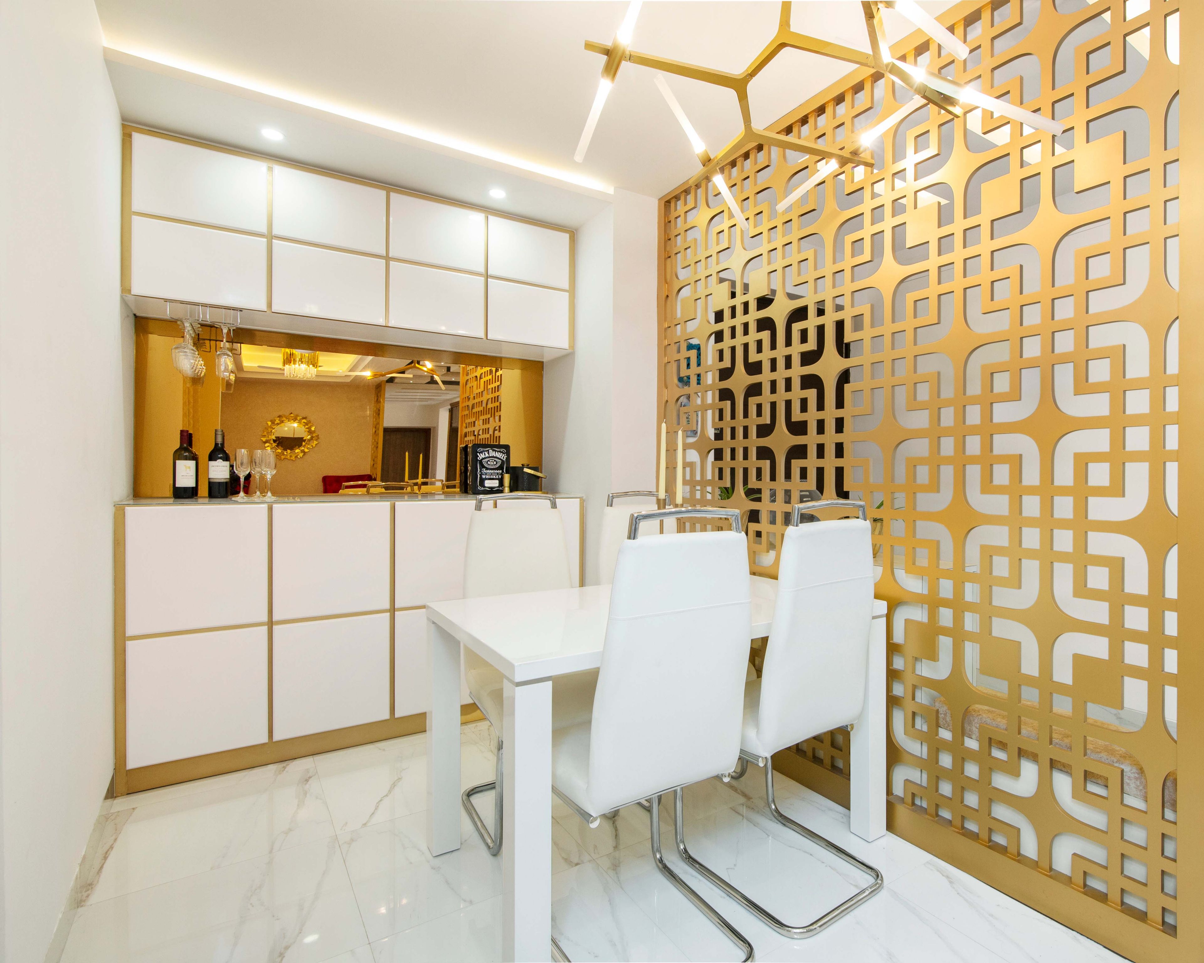 Exclusive White 4-Seater Dining Table In White With Bar Unit And Gold-Toned Partition - Livspace