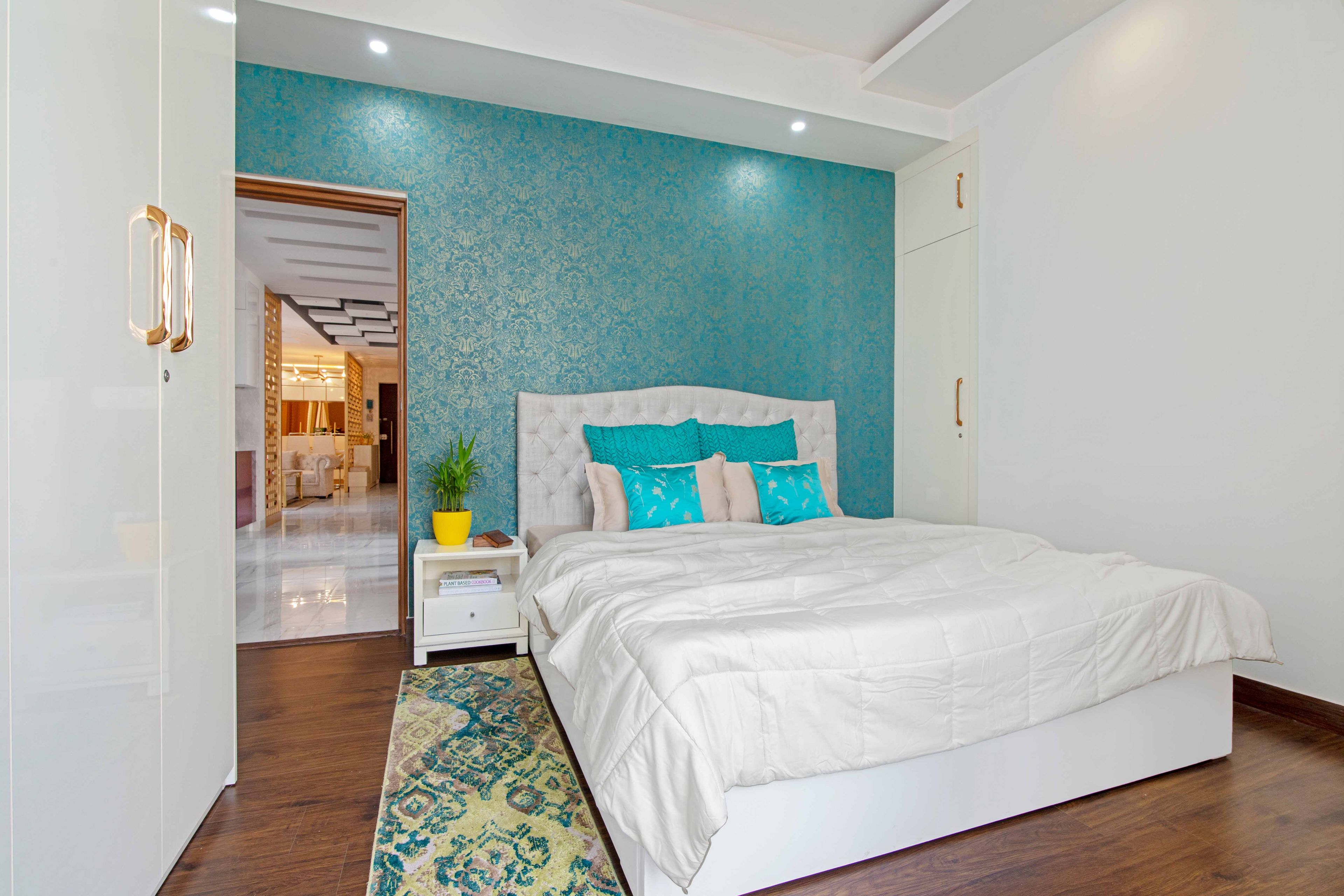 Blue And White Master Bedroom With 3-Door White Swing Wardrobe - Livspace