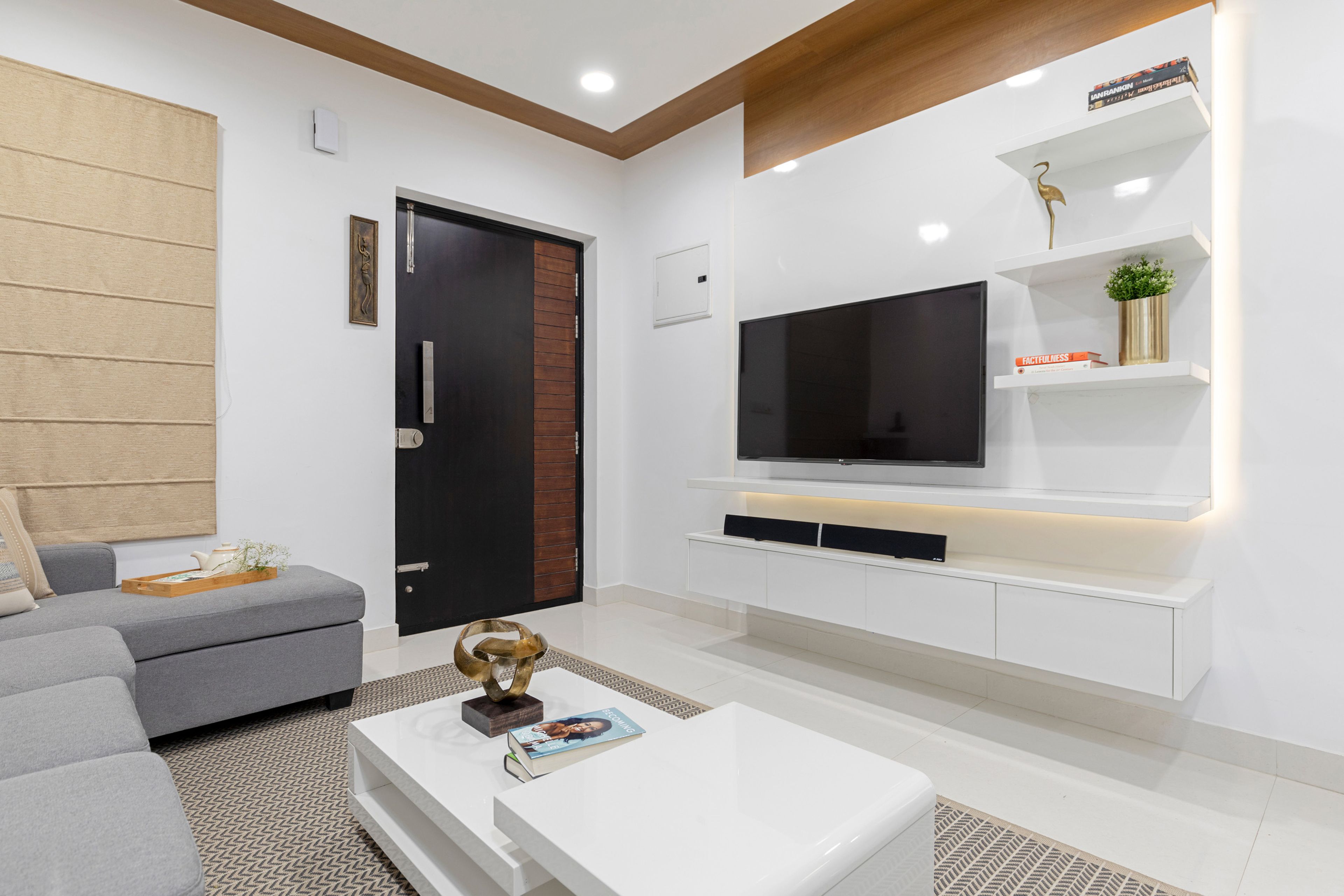 U-Shaped Living Room Design with White TV Unit