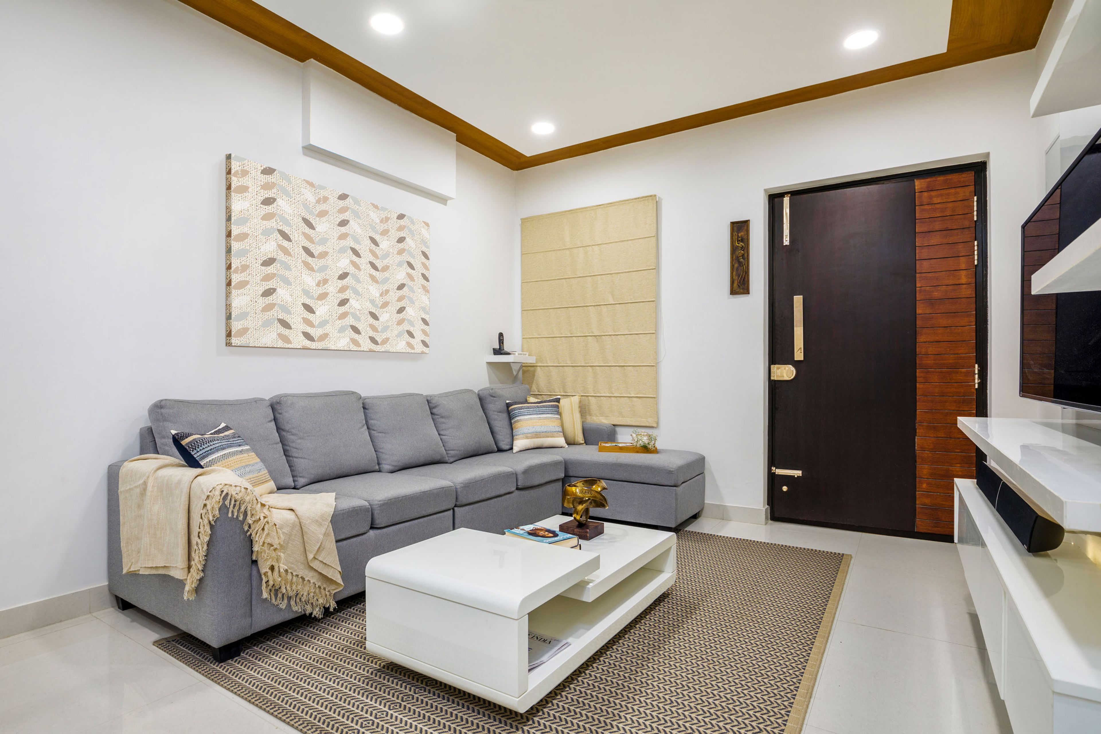 Contemporary Earthy Toned 2 BHK Flat Design with Island Kitchen