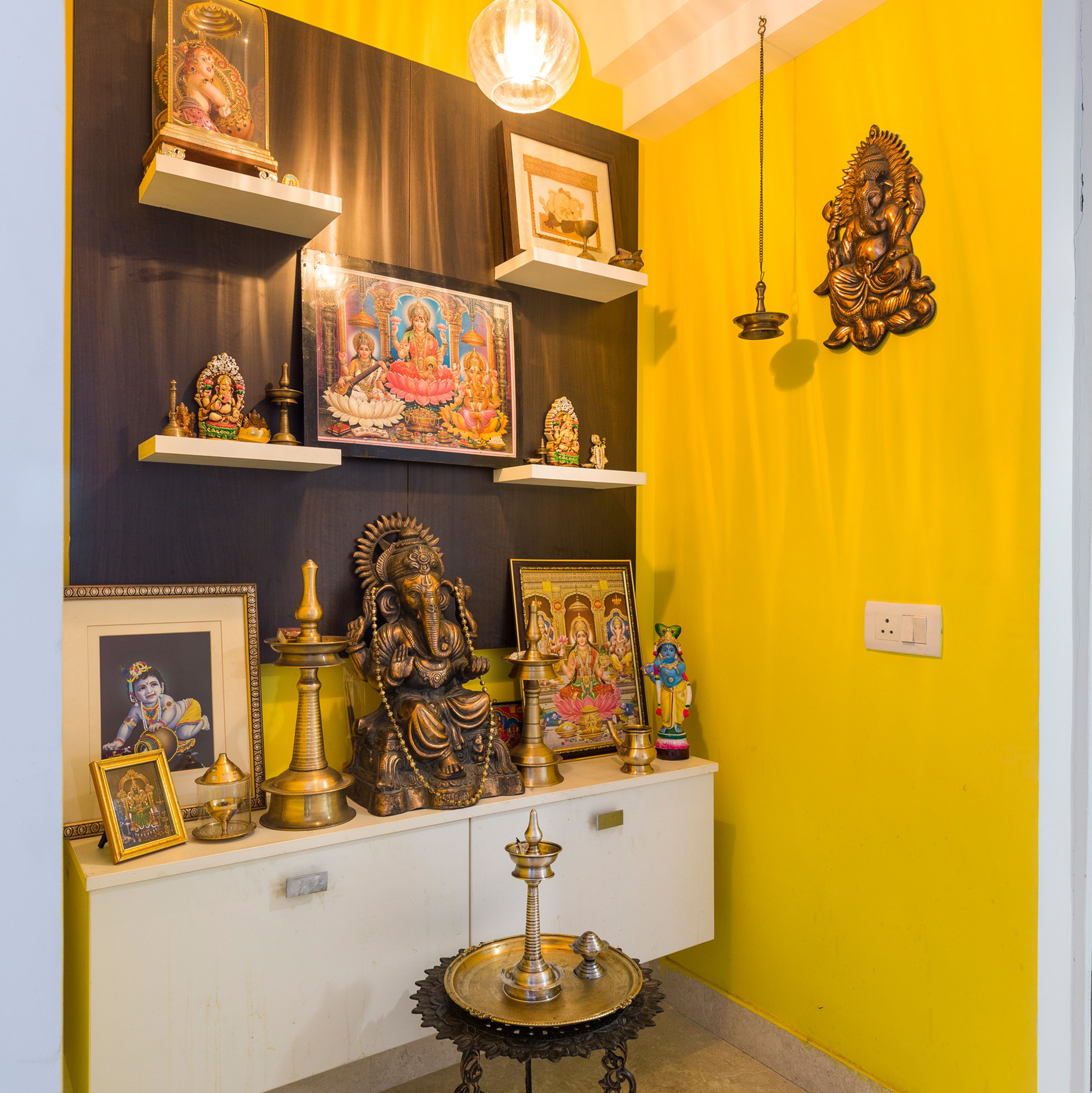 Pooja Room Design with Yellow Wall