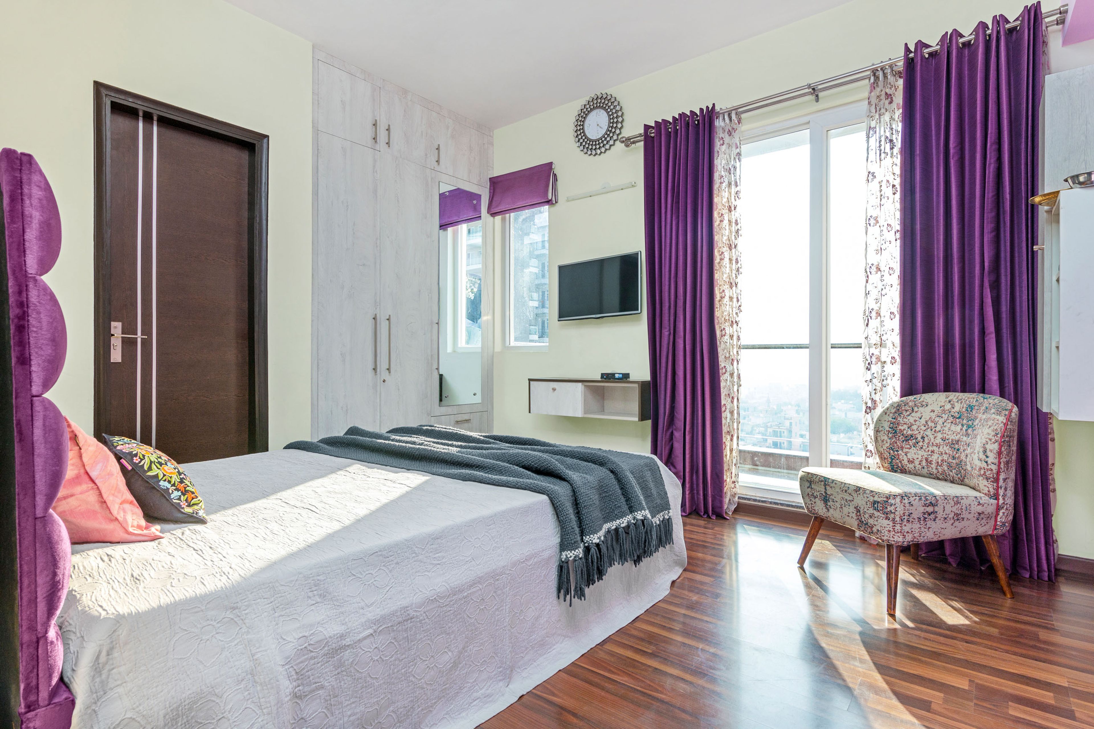 White And Purpe Bedroom Design With Light Wood Mirrored 3-Door Swing Wardrobe - Livspace