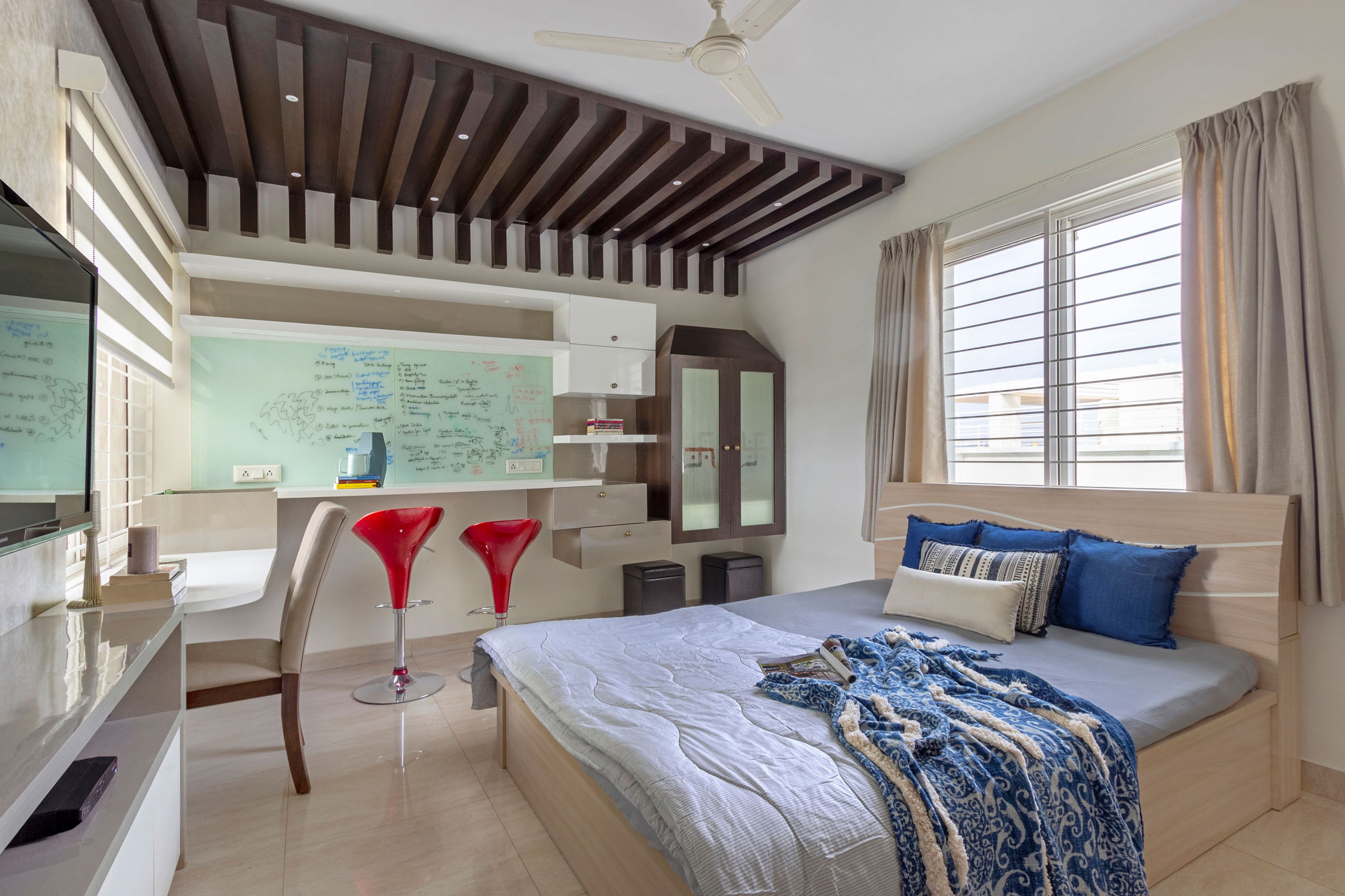 Guest Bedroom Design with Closed Pooja Unit