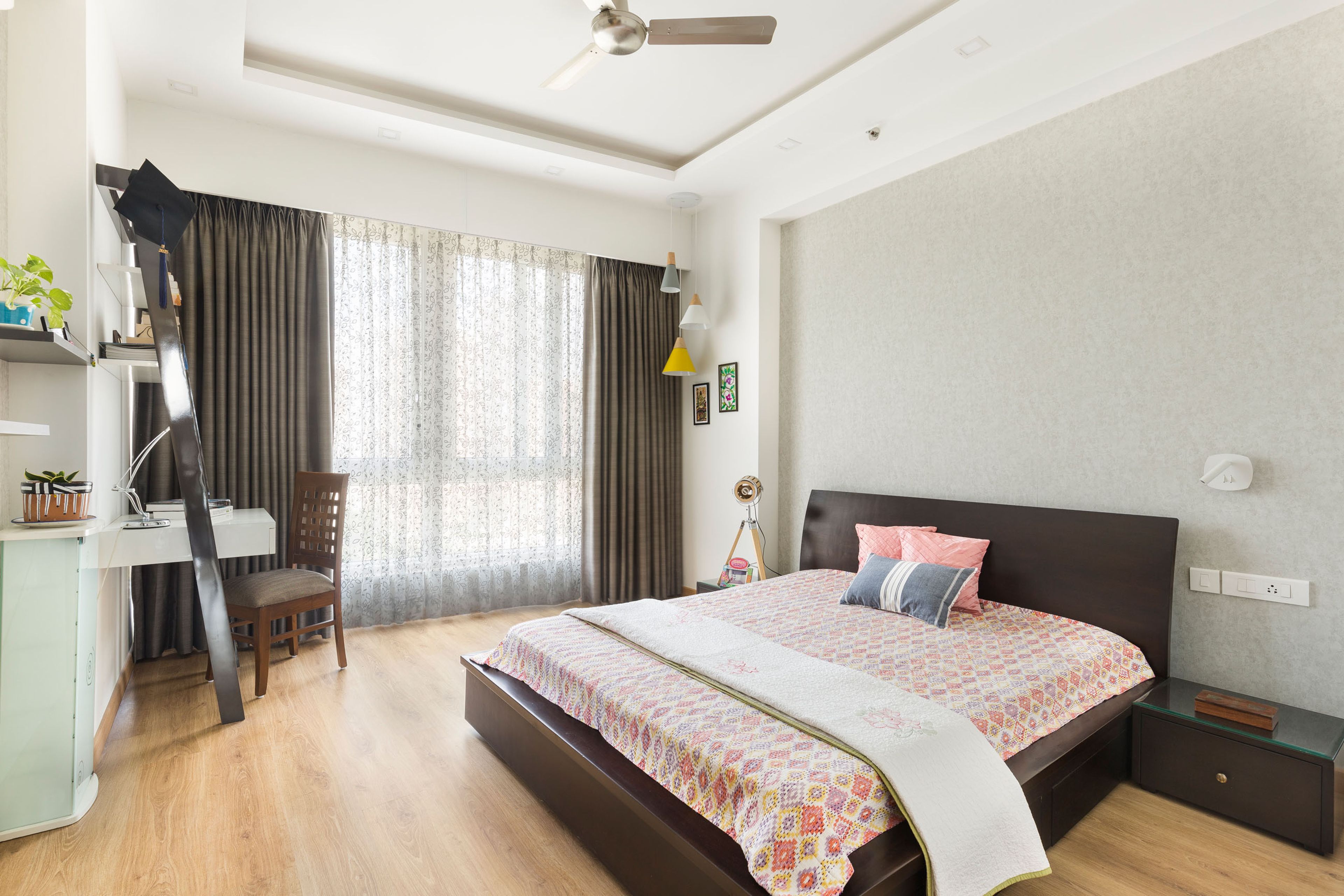 Kid's Bedroom With Wooden Queen Bed And Wall-Mounted White Study Table- Livspace