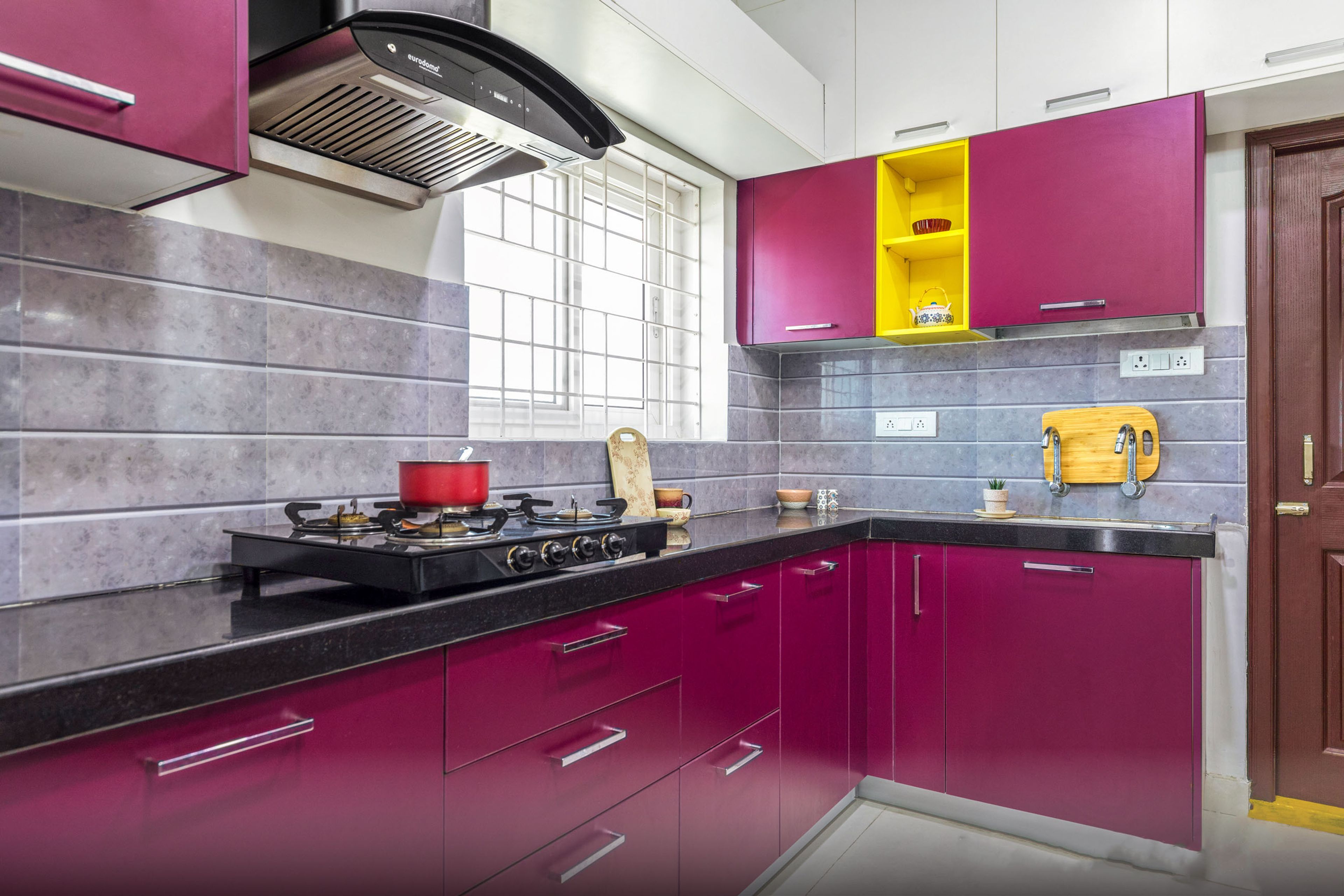 Contemporary L-Shape Kitchen Design With Dark Pink Cabinets And Granite Kitchen Countertop