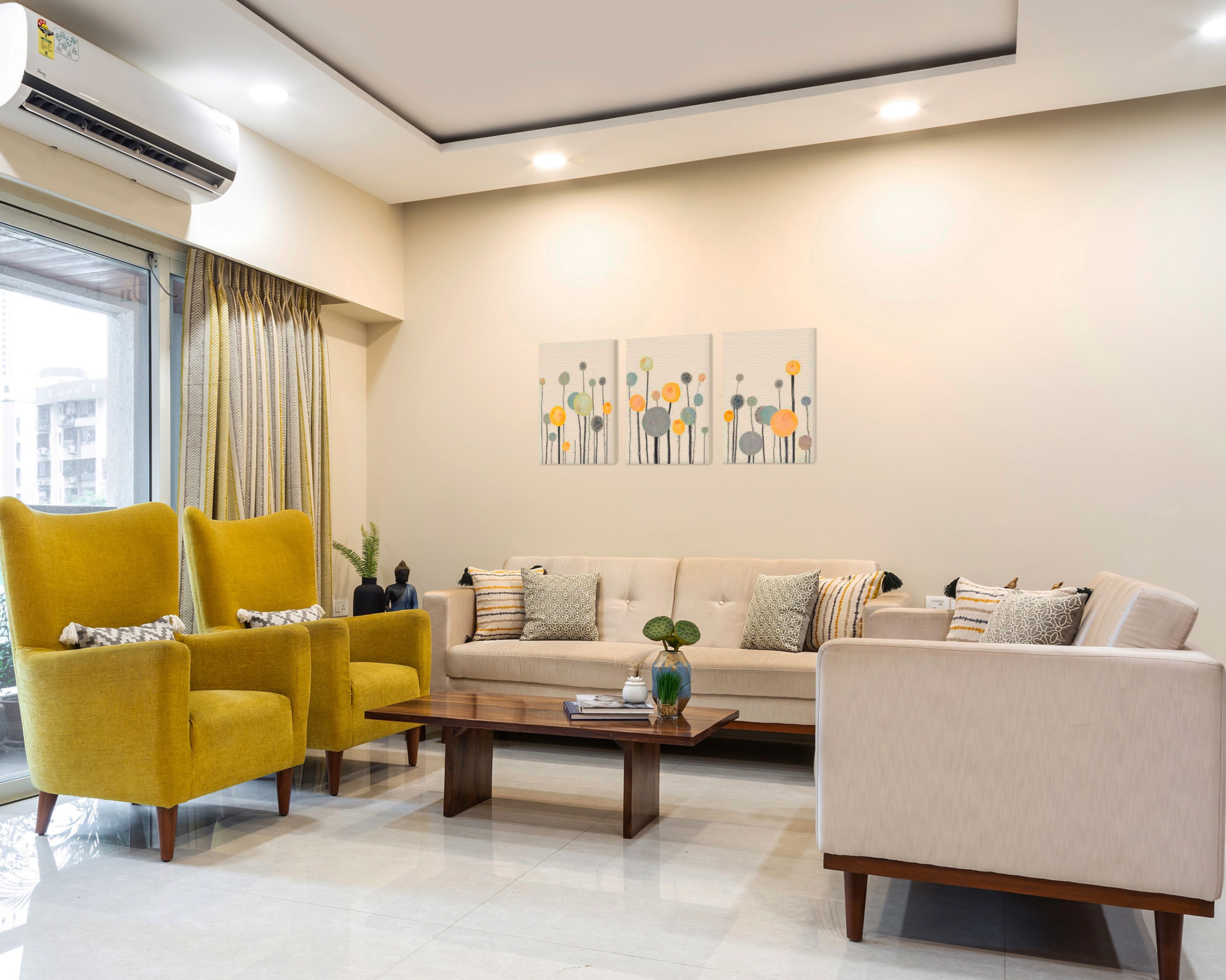 Living Room Design WIth Beige Sofas, Yellow, Accent Chairs And Wooden Rectangular Coffee Table - Livspace