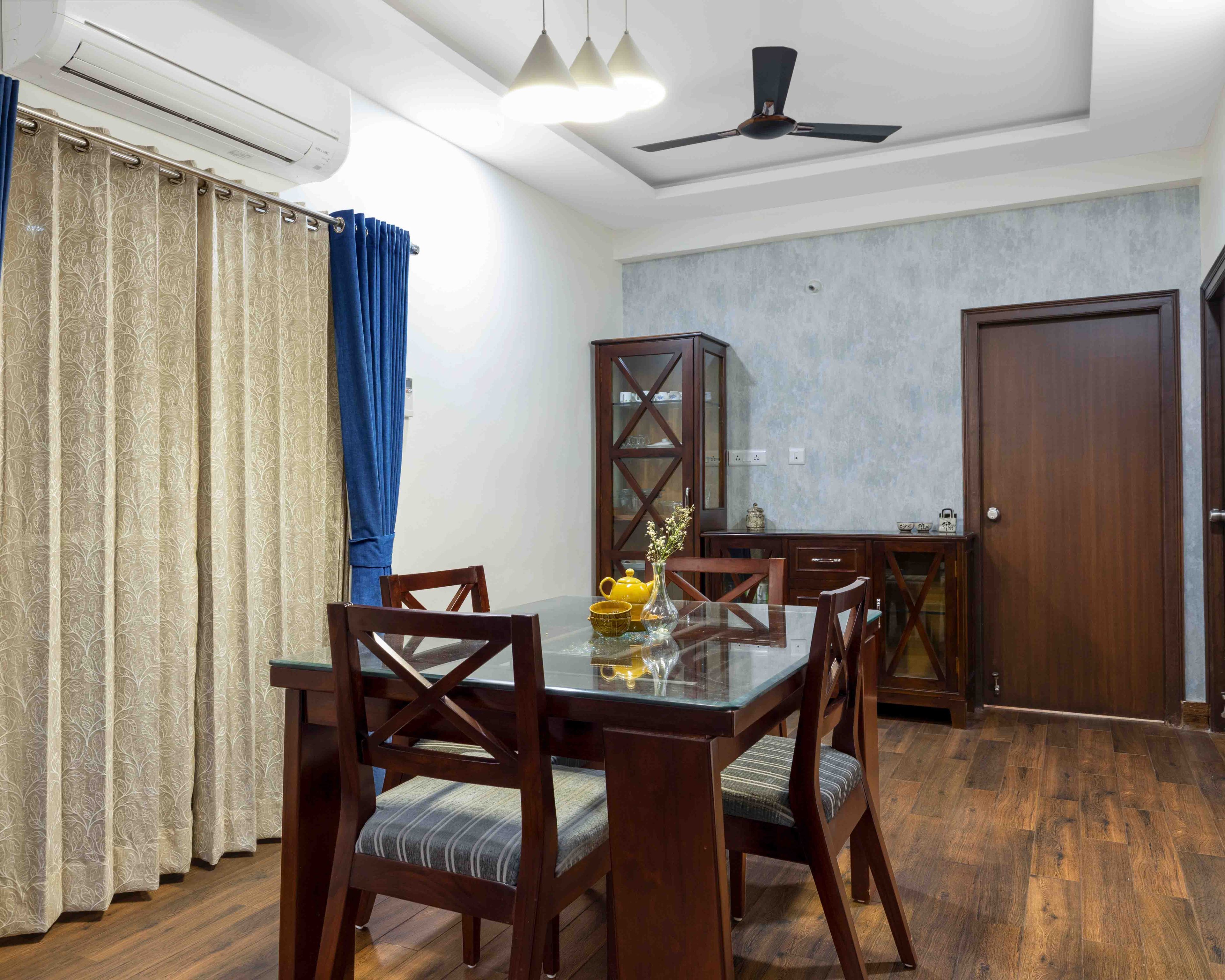 Classic 4-Seater Wood And Grey Dining Room Design With Wooden Crockery Unit