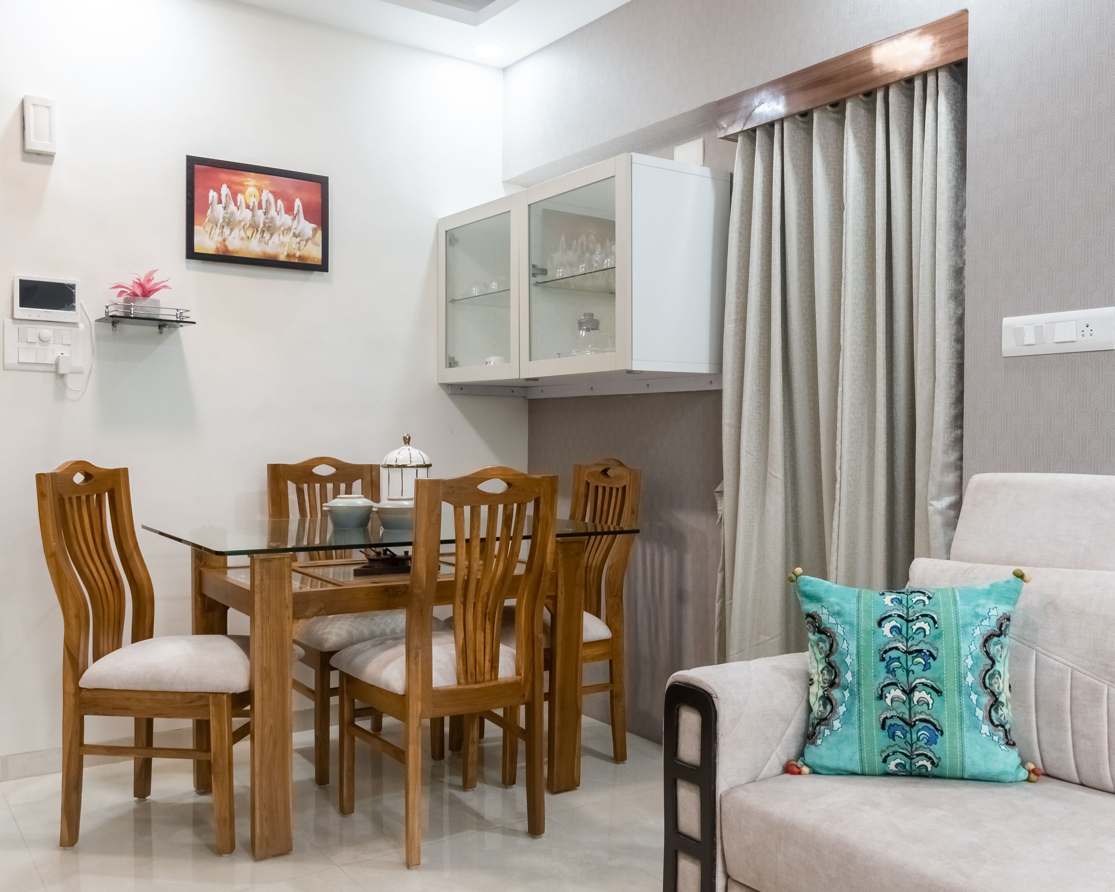 Classic 4-Seater Wood And Beige Dining Room Design With Wall-Mounted White Storage Unit