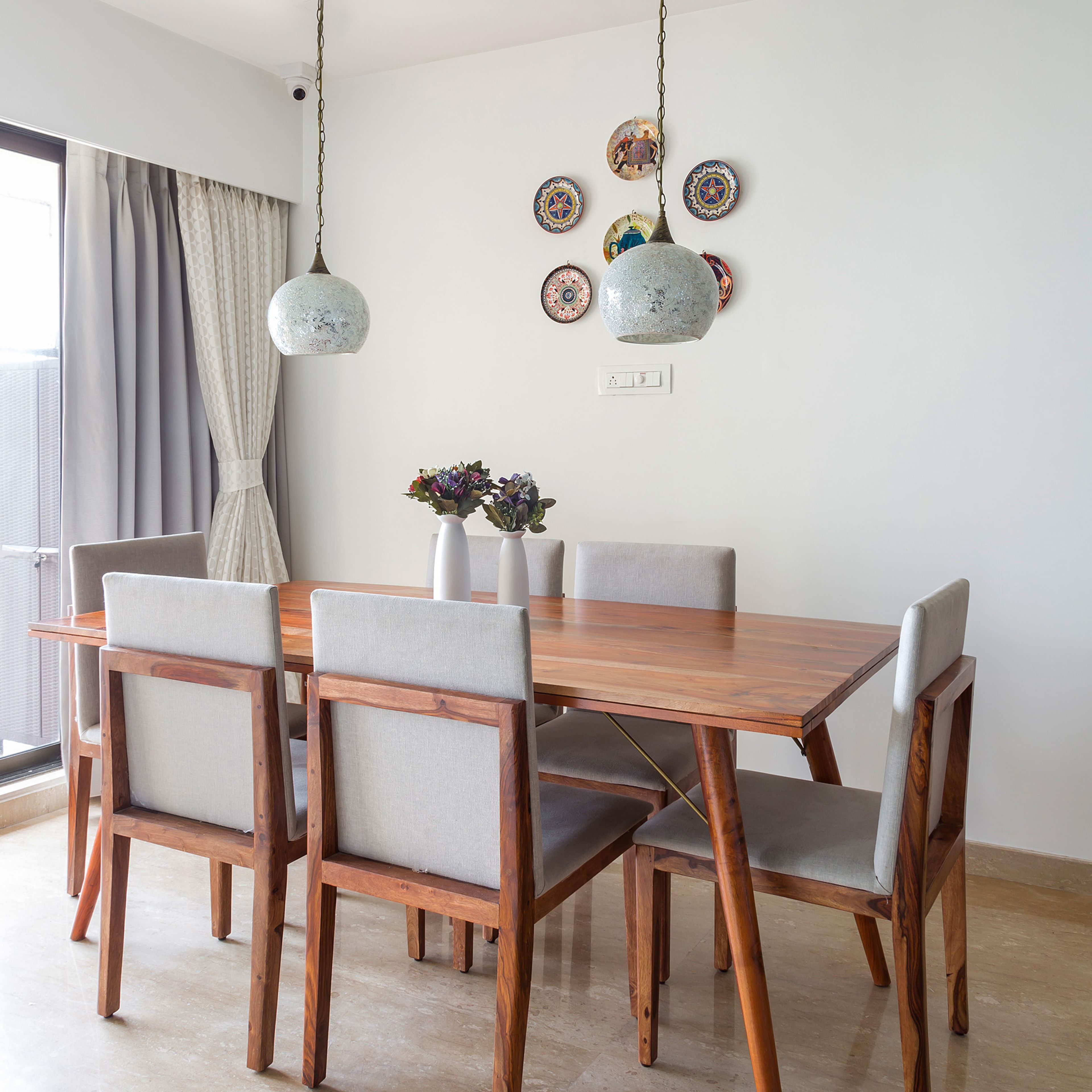Minimal 6-Seater Wood And Grey Dining Room Design With Pendant Lights