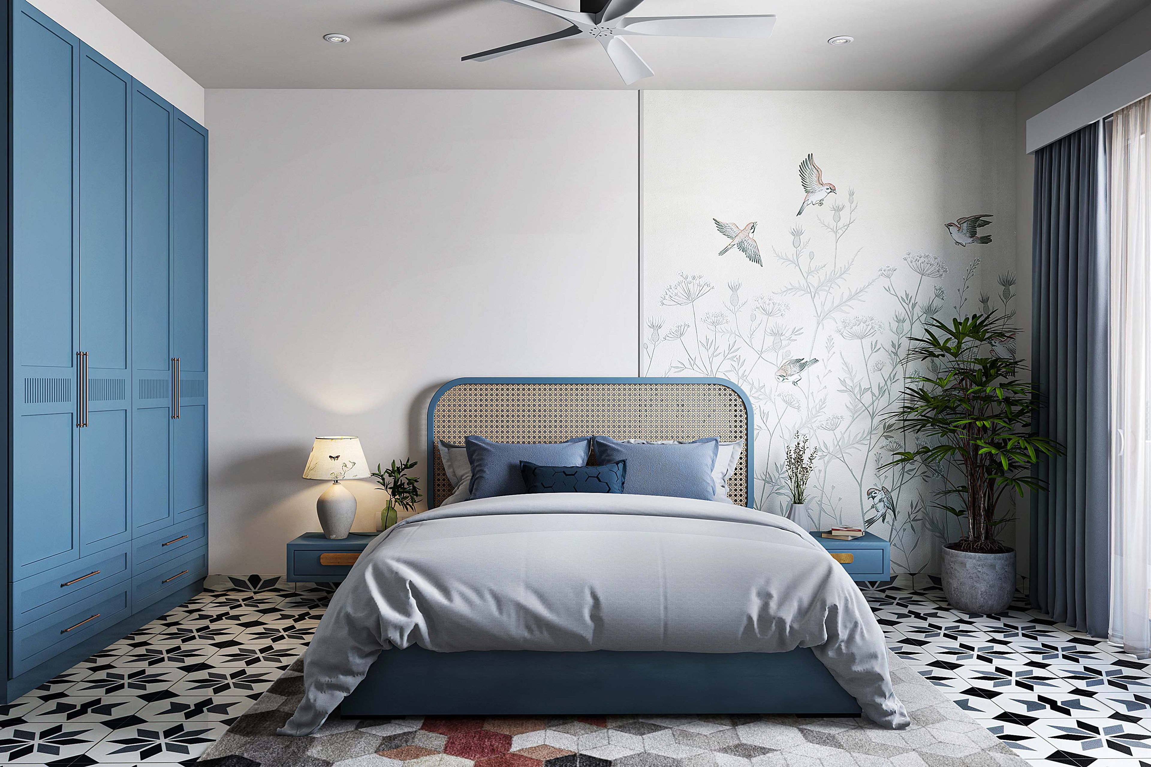 Nature-Themed Wallpaper Design For Bedroom With Blue Bed And Blue Wardrobe - Livspace