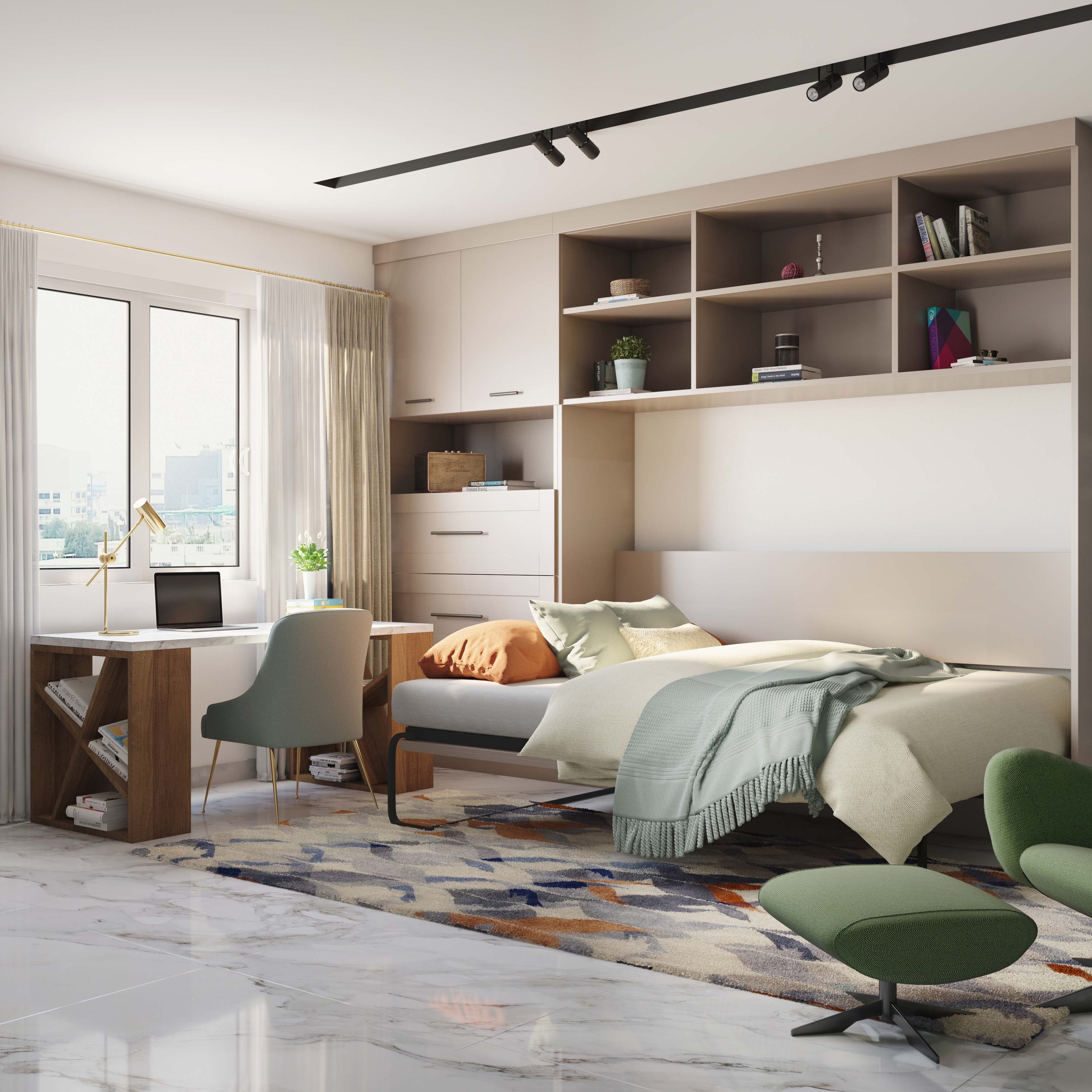 Spacious Space-Saving Bedroom Design With Beige Storage And Murphy Bed, Green Accent Chair And Integrated Wood And White Study Table - Livspace