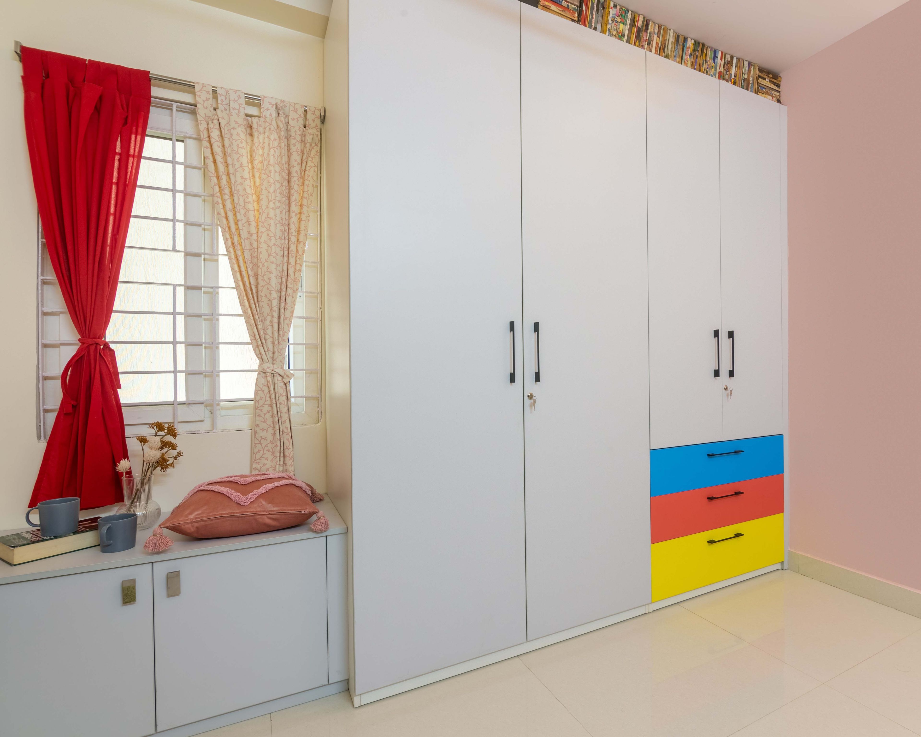 Modern White 4-Door Wardrobe Design With Multicoloured Drawer Storage