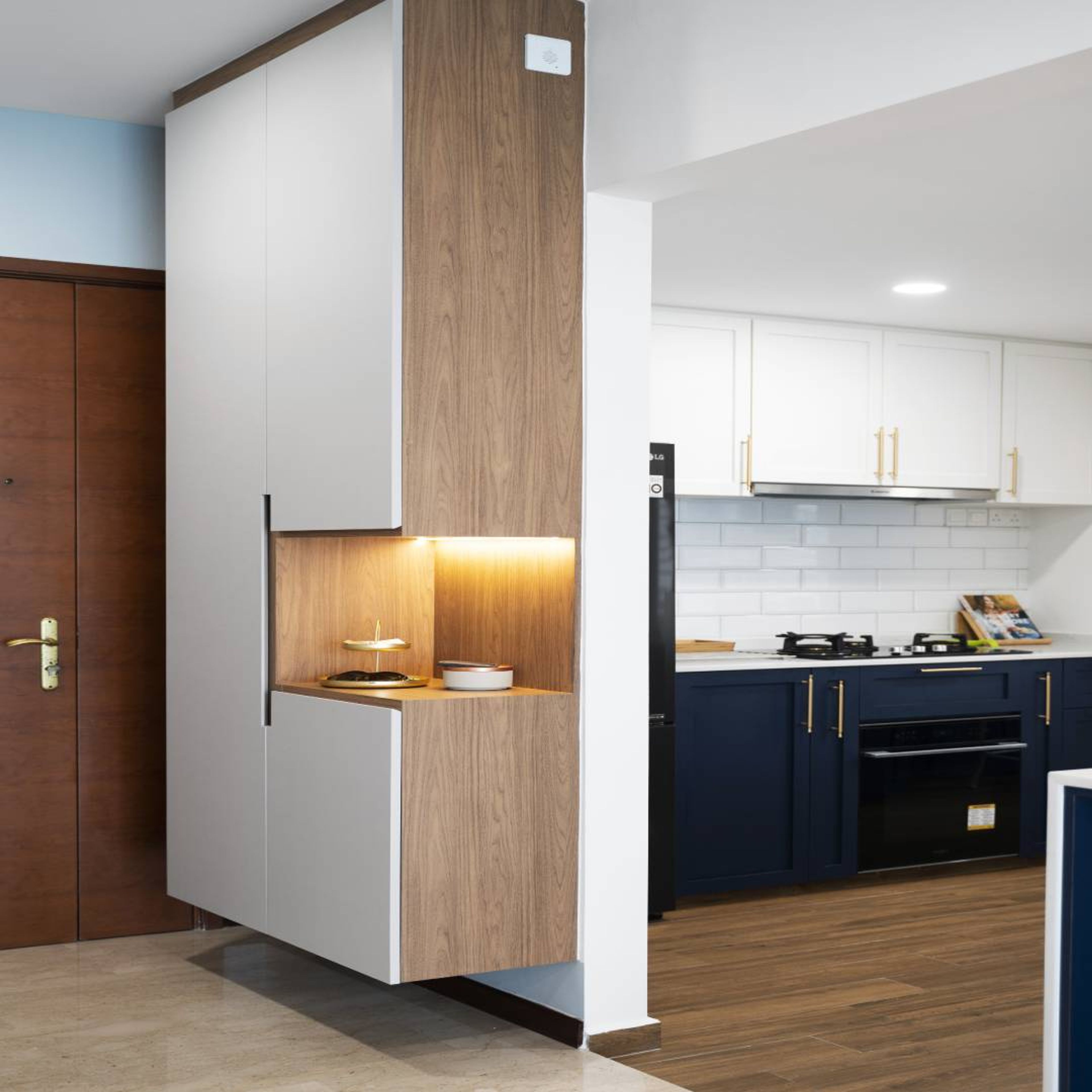 Modern White And Wood Foyer Design With Wall-Mounted Storage Unit