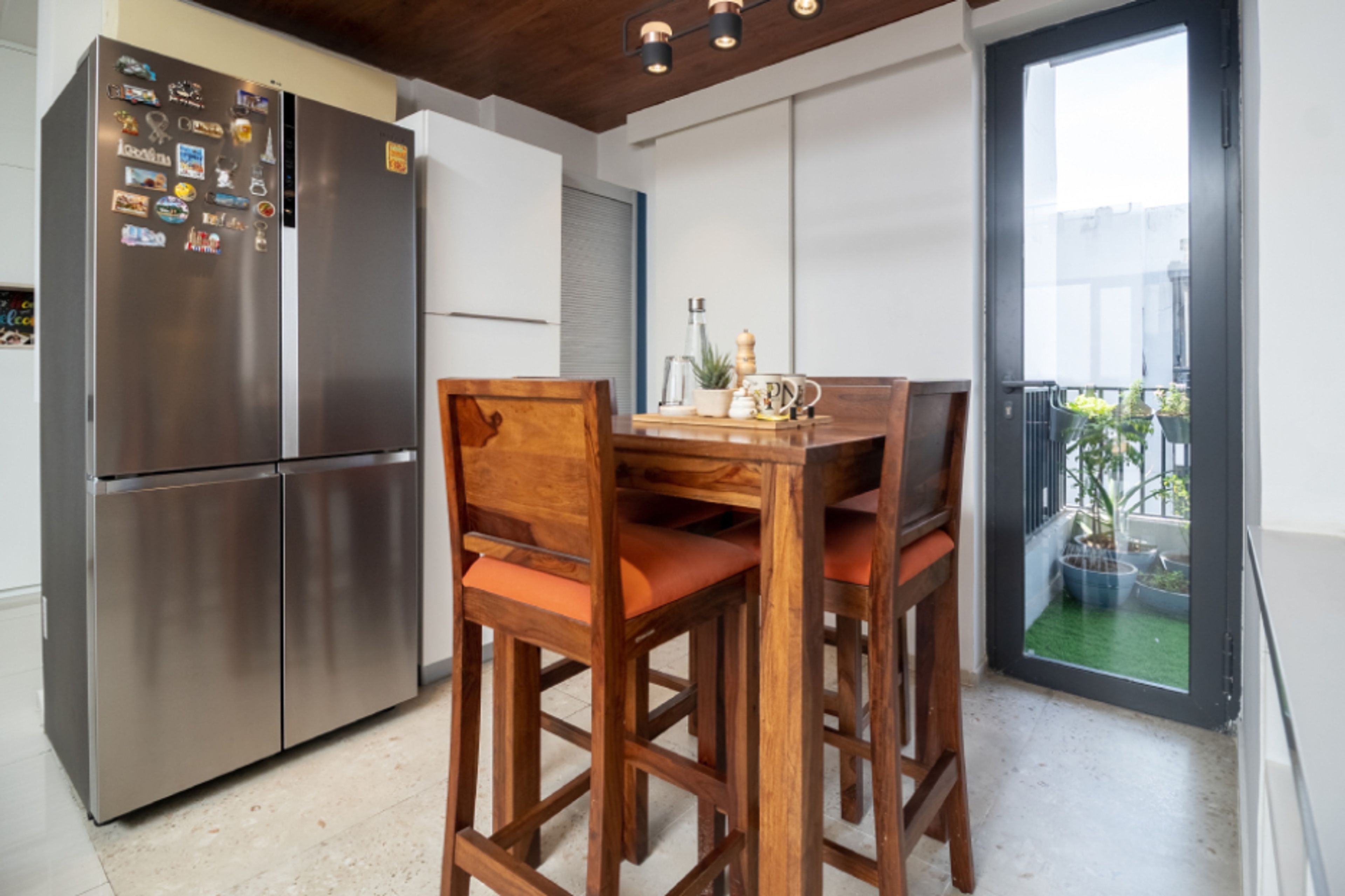 Rustic 4-Seater Dining Room - Livspace