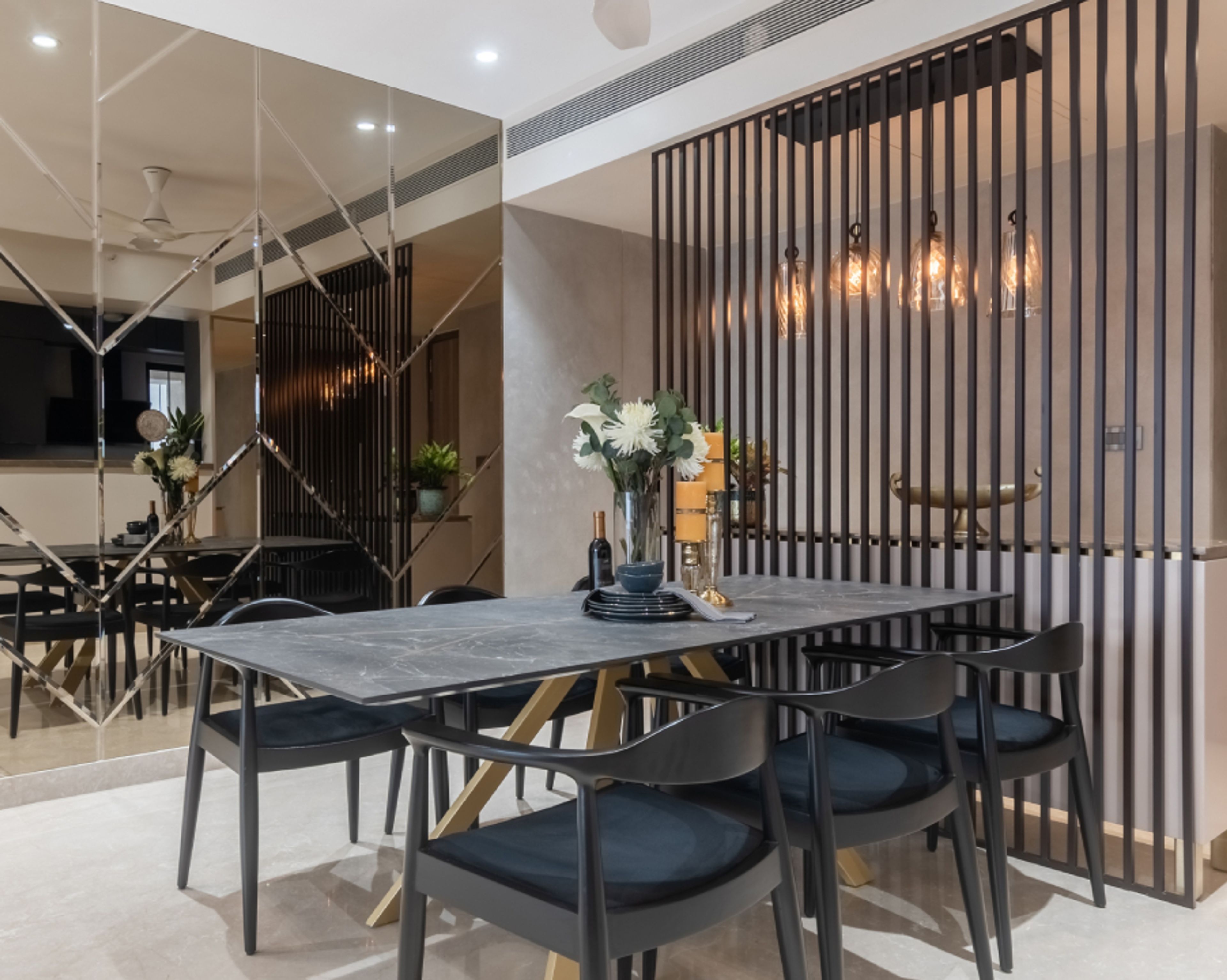 6-Seater Dining Room Design With Tinted Mirror Panelling - Livspace