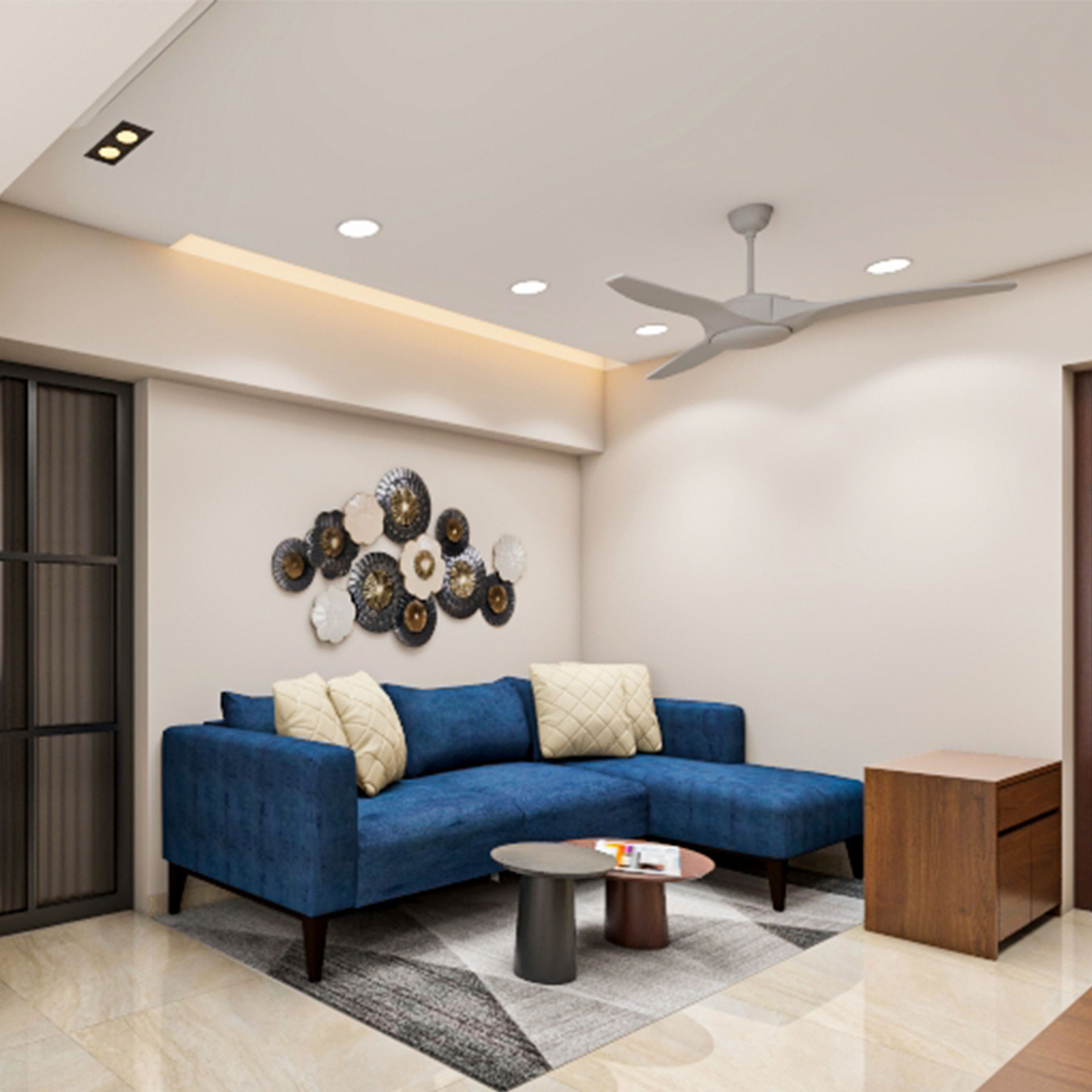 Living Room Design With An L-Shaped Sofa And Nested Center Tables - Livspace