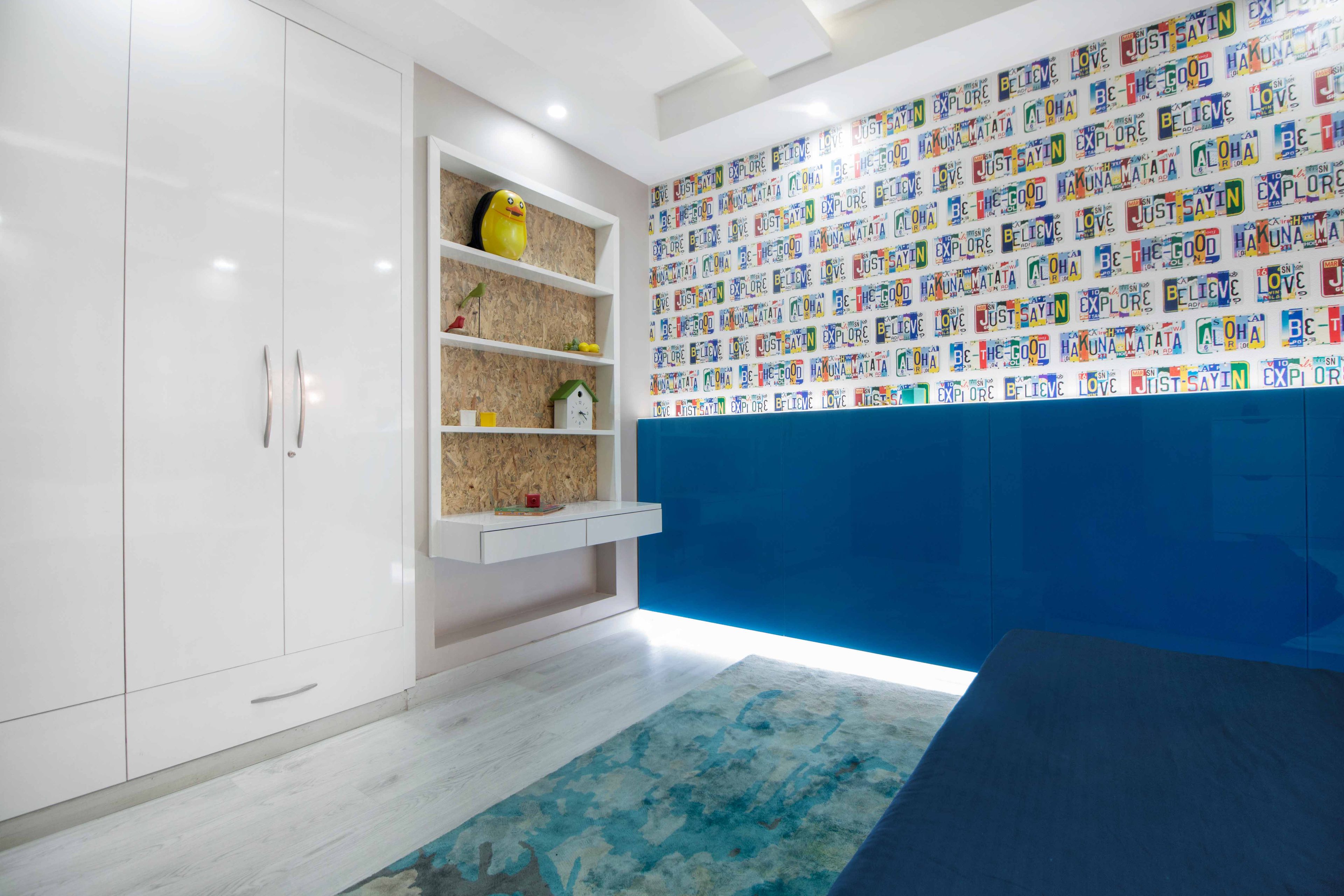 Kids Room Design With Grey Tufted Headboard - Livspace