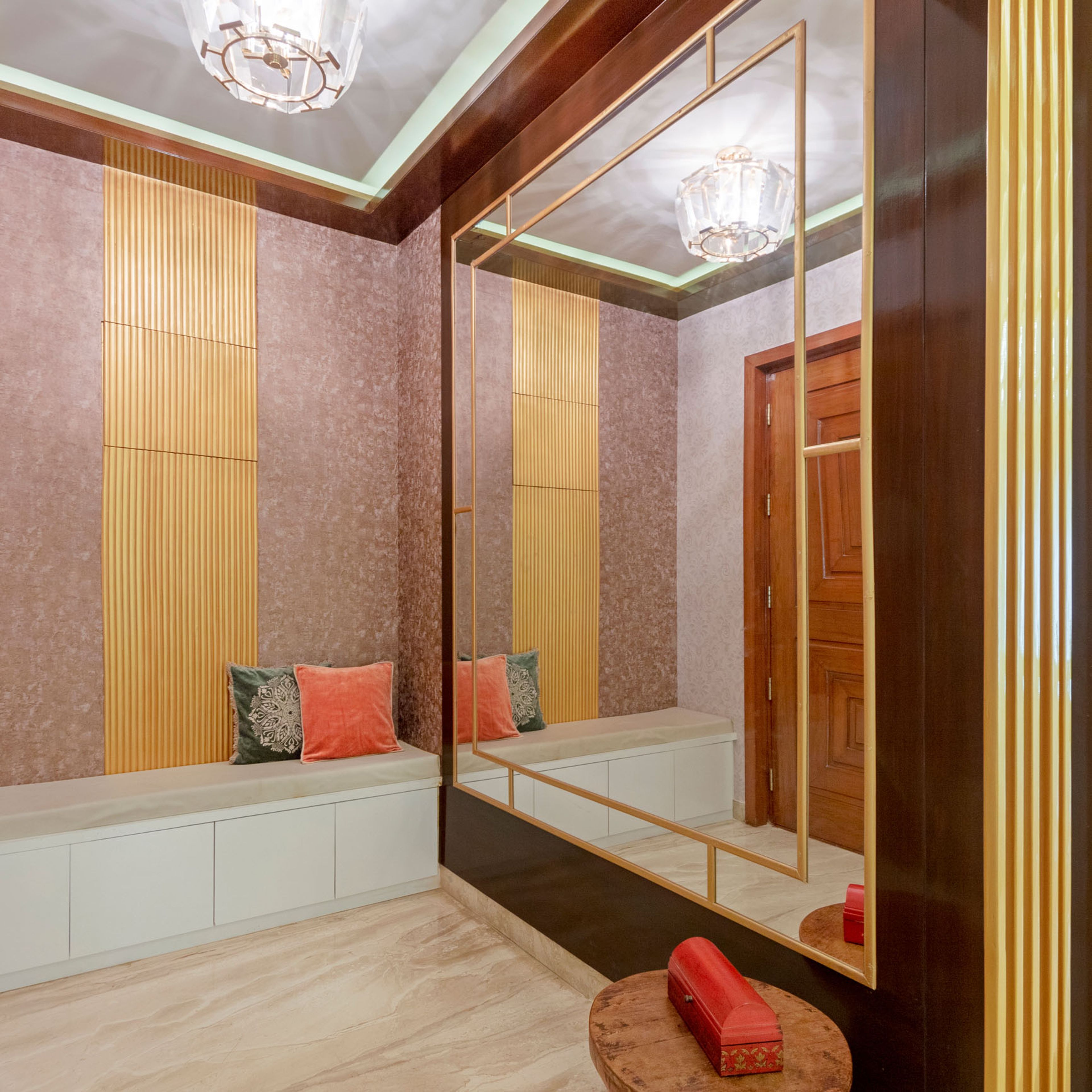 Frosty White Foyer Design With Large Wall Mirror  - Livspace