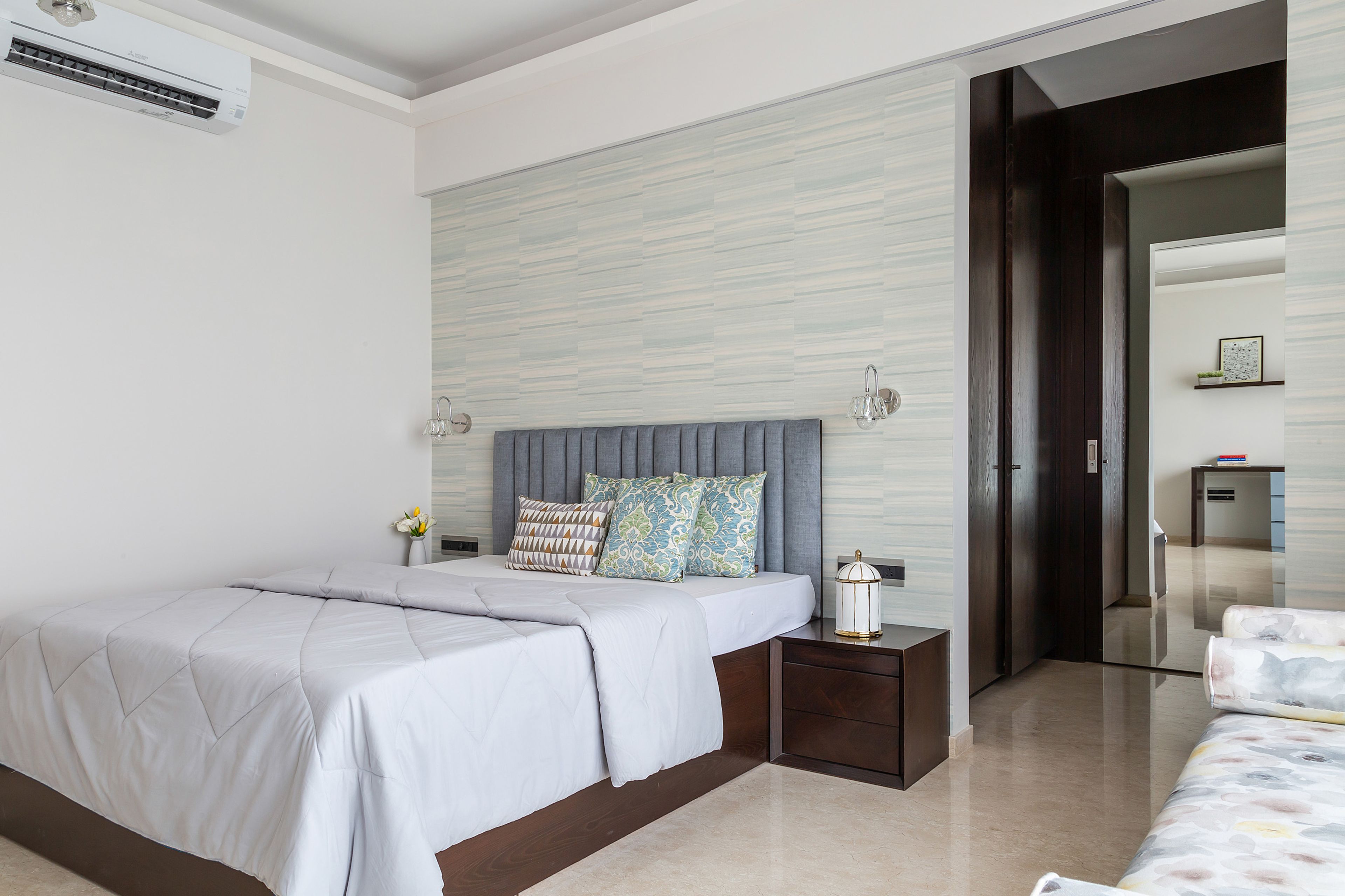 Grey and white kids room design with patterned wallpaper - Livspace