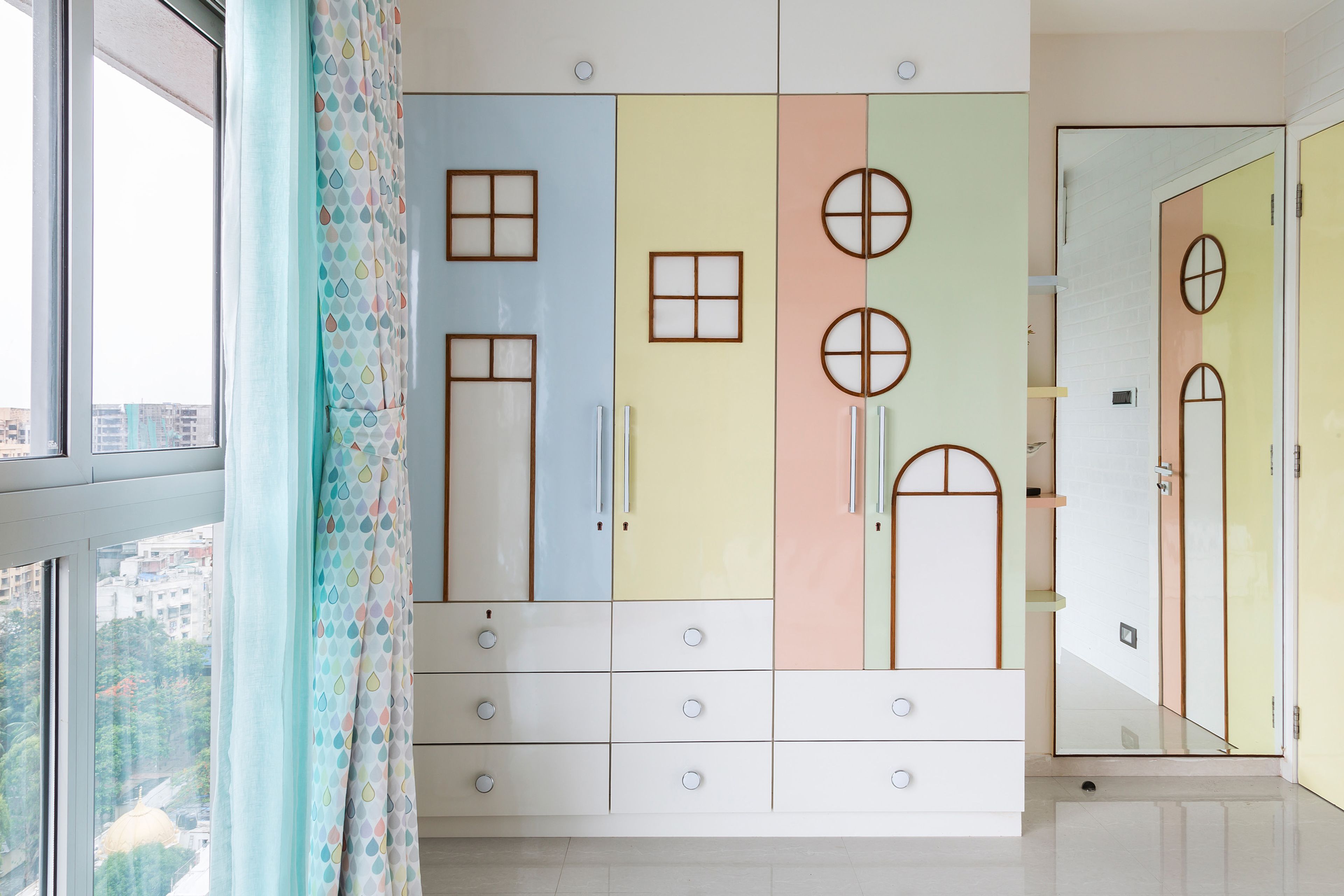 Pastel-Toned Multicoloured Wardrobe For Kids - Livspace